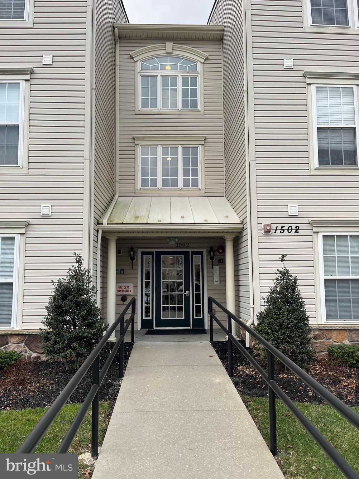 Check out this 2 bedroom 2 bath retreat in Hearthstone One West Bristol over 55+ community.  This unit features a beautiful open kitchen with abundant wood cabinetry and stainless steel appliances.  The bright open  floor plan provides tons of natural light.   Each bedroom has its own en-suite bathroom and is located at opposite ends of the home providing an option for privacy.  Extras include a gas operated fireplace, walk-in closets, large storage closet, a bonus gathering area on each floor, a private balcony with views of the beautiful courtyard with gazebo, shared storage on each floor by elevators, and some additional storage in utility closet on patio.