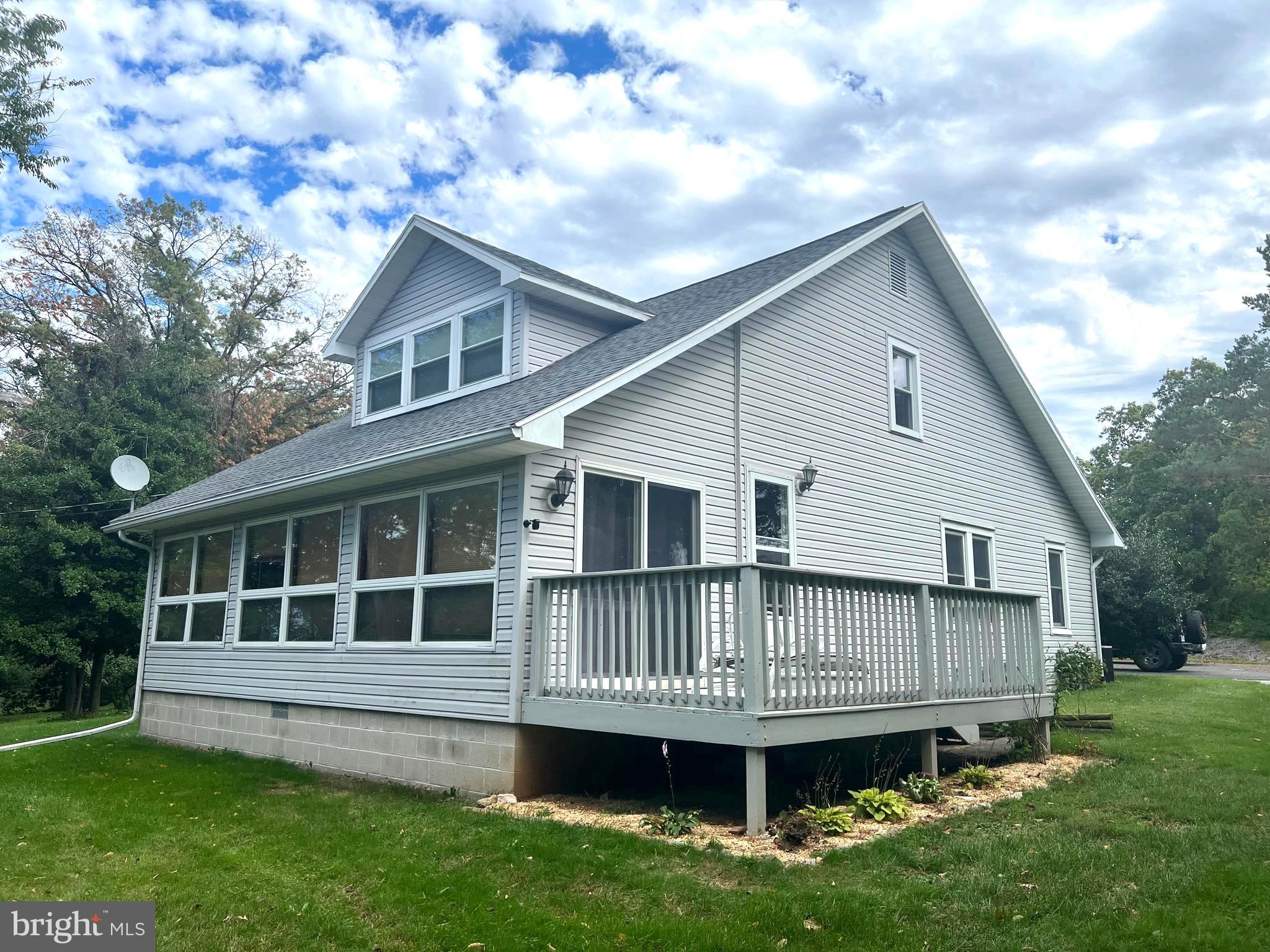 Here is your chance to own a beautiful 4 bedroom home on almost in acre in Northern School District! This charming cape cod style house is just waiting for your personal touches to make it your own! The main floor features plenty of living space with a walk through kitchen, living room, dining room, and front room with lots of natural light that could be used as a sanctuary for your plants, or reading your favorite book!  Also on the main level are two bedrooms and a full bathroom.  The second level features two more bedrooms with a connecting bathroom.    There is no shortage or storage space in the 3 car detached garage and shed on the property as well! Enjoy the vantage point from your hilltop property that feels secluded yet is close to Route 15 making your commute a breeze.  This is one you need to see to truly appreciate!  Schedule your showing today!