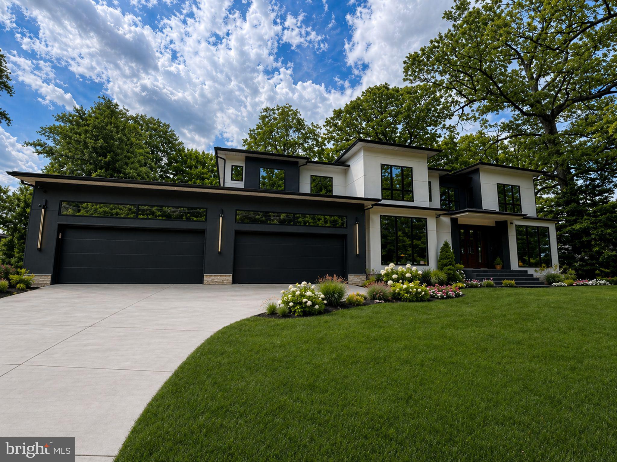 Welcome to 2537 Gallows Rd — where bold modern design meets one of Northern Virginia’s most connected and sought-after locations,  >9 minute walk to Dun Loring metro, >9 min drive to Tysons >4 minutes drive to the Mosaic District and major commuter routes. A striking new construction residence offering approximately 8,700 square feet, 7 bedrooms, 6.5 bathrooms, and a 4-car garage. Thoughtfully designed with high-end finishes and a layout that truly lives well, this home delivers both luxury and functionality in one of Northern Virginia’s most connected locations.
From the moment you enter, you’re greeted by a dramatic two-story marble foyer that immediately sets the tone. Wide-plank hardwood floors carry throughout the main level, where an open, modern layout unfolds. At the heart of the home is a show-stopping chef’s kitchen, complemented by a fully equipped secondary (spice) kitchen—perfect for entertaining, catering, or everyday cooking at scale. A walk-through pantry seamlessly connects the spaces, offering both convenience and exceptional storage. The main kitchen is outfitted with Sub-Zero refrigeration, a Wolf range, sleek black countertops, glossy white cabinetry, and modern brass accents—bringing together both style and performance.
Just beyond, the home opens into a breathtaking two-story family room featuring coffered ceilings and a floor-to-ceiling fireplace that creates an unforgettable focal point, adding both scale and warmth. Off the kitchen, a sun-drenched breakfast area is surrounded by windows, filling the space with natural light and creating the perfect everyday gathering spot.
A private main-level bedroom with a full bath offers flexibility for guests or multigenerational living, while access to the Trex deck allows for easy indoor-outdoor entertaining.
Upstairs, the primary suite is a true retreat, complete with a private tiled balcony, a sitting area with its own fireplace, and a luxurious marble bathroom designed for relaxation. Three additional bedrooms each feature en-suite baths and custom walk-in closets, with two bedrooms sharing access to a private balcony—ideal for quiet moments and fresh air.
The walkout lower level is a standout feature, filled with natural light from oversized windows that make it feel bright and inviting throughout. This level offers incredible versatility with space for a gym, theatre, and additional living areas, along with a bedroom and full bath. A wet bar with an island anchors the space, making it perfect for entertaining. Step outside to a backyard ready to be transformed into your own private retreat, with endless possibilities for custom hardscaping and outdoor living.
Throughout the home, elevated details continue to impress, including floating stairs with integrated lighting, smart toilets, body jets in every shower, and sleek aluminum windows that enhance the home’s modern aesthetic and its complete with an elevator shaft fully equipped for every level. 
Ideally positioned just minutes from Tysons Corner, Walking distance to Dun Loring Metro, Tysons Galleria, the Mosaic District, and major commuter routes including I-66 and I-495, this location offers unmatched convenience for shopping, dining, and everyday travel and an active lifestyle positioned directly across from the W&OD Trail and park, offering immediate access to miles of scenic walking, running, and biking paths—making it an exceptional choice for those who value both luxury living and accessibility.
A rare opportunity to own a custom-built home that seamlessly blends bold design, modern elegance, and a location that keeps you close to everything.