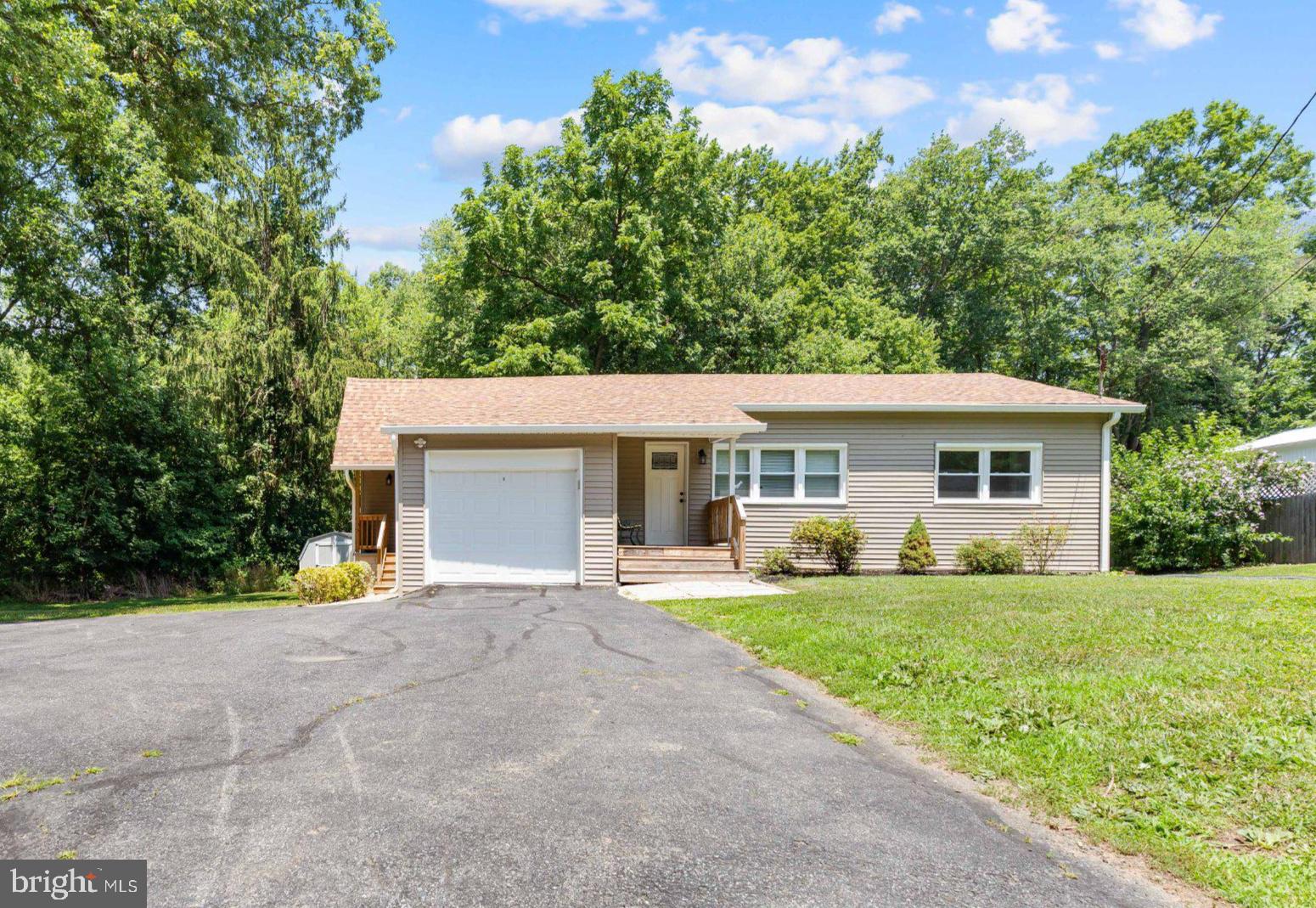 This charming 2-bedroom, 1-bathroom ranch-style home, with major renovations completed in 2024, offers a perfect blend of classic appeal and modern convenience. With a total finished area of 1,228 sq. ft., the property features a partially finished basement, providing additional space for customization. The kitchen is equipped with essential appliances, including a built-in microwave, electric range,  dishwasher, pantry, and refrigerator, making meal preparation a breeze. Situated on a manageable  0.34-acre lot, this property boasts an attached garage with space for one vehicle and a driveway accommodating up to four additional cars as well as a spacious shed. The exterior is crafted from durable block and vinyl siding, ensuring low maintenance and longevity.  Residents will enjoy easy access to local amenities, including parks, shopping centers, communter routes and dining options, perfect for those seeking a peaceful yet connected lifestyle. Don't miss your chance to make this house your own!