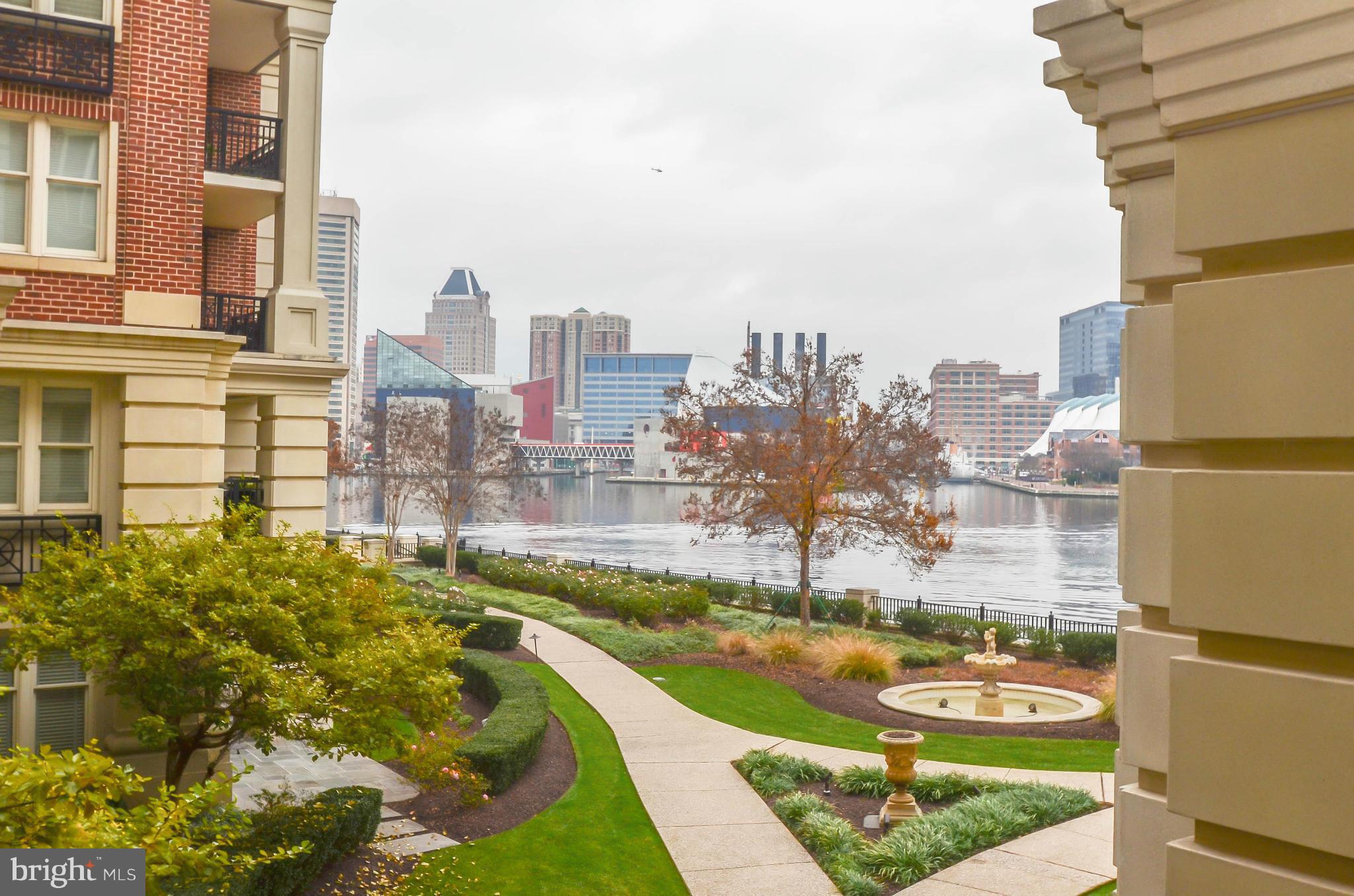 Enjoy the Ritz lifestyle! Rare opportunity to purchase over 2500 square foot, 2 bedroom and den with water views and 2 balconies at this price.  Wood floors throughout most of unit.  Elegant custom kitchen, built-ins, millwork and coffered ceiling.Includes.Condo fee includes gas, heat, hot water and cable.Pool, exercise, lounge, theater and billiards rooms.2 deeded garage spaces.Shows beautifully.