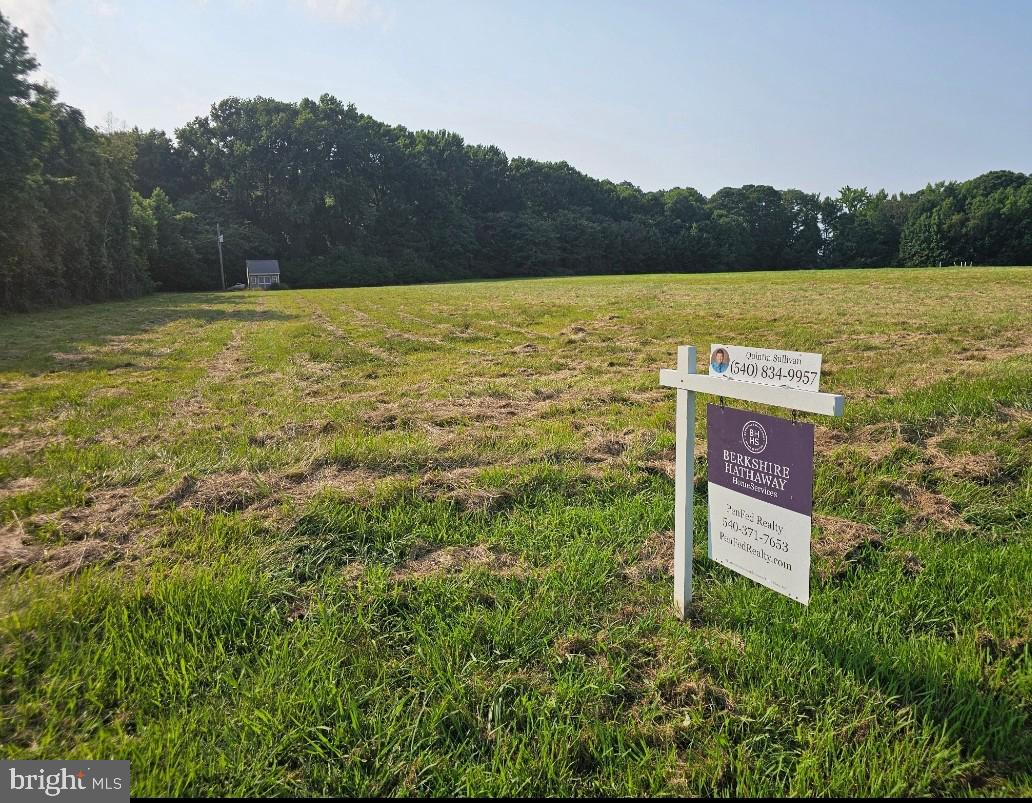 Beautiful, 2+ acre level building lot with water views community well access, approved gravity septic site, community dock and community boat ramp with deep water access to Hulls Creek, Potomac River and Chesapeake Bay.