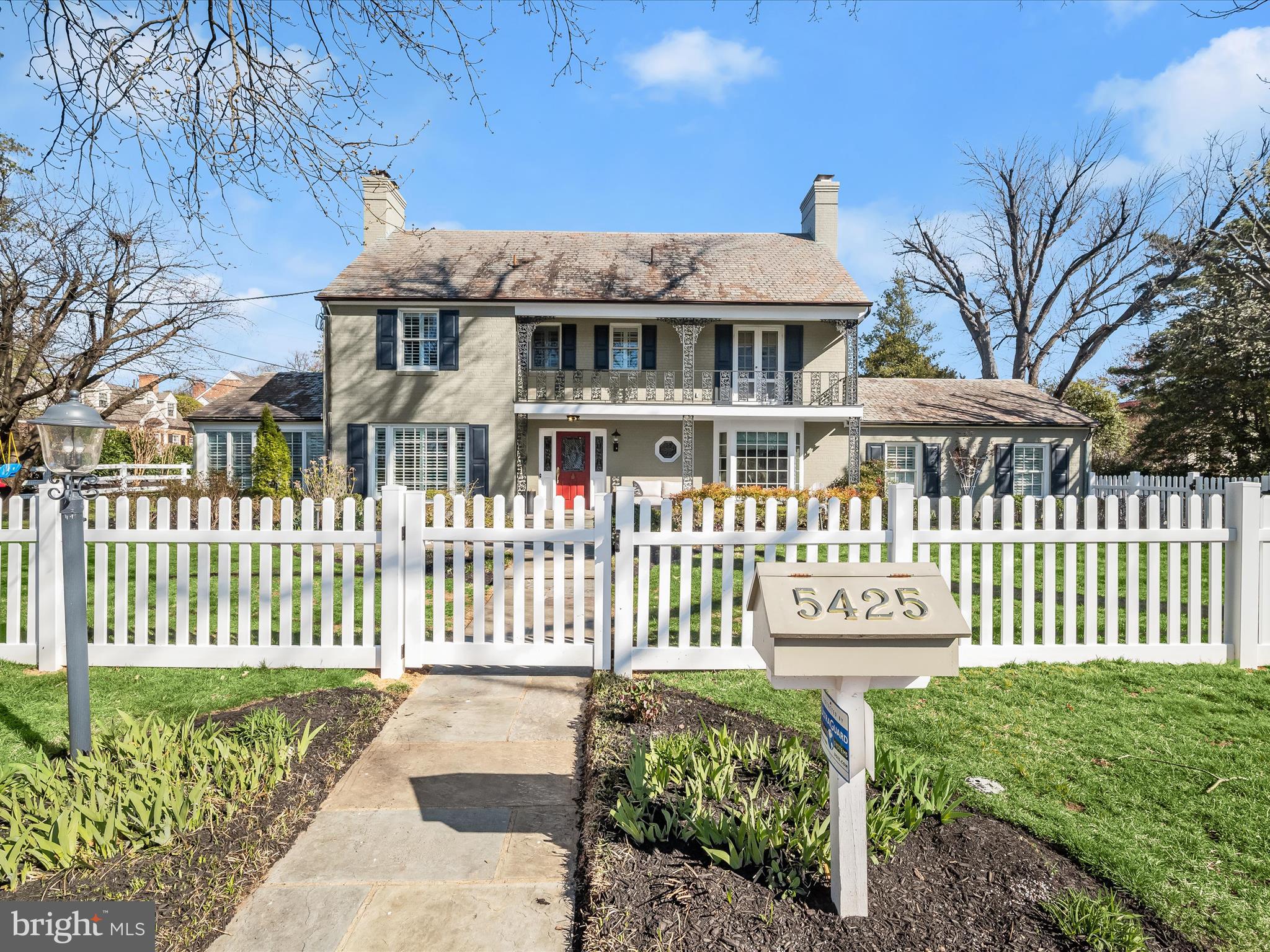 Nestled in a small enclave of custom homes, on a lush and beautiful corner lot fringed with a new vinyl clad picket fence, and bright yellow forsythia,  this all brick colonial is a standout with modern distinction.  Once inside the white picket fence, garden beds and slate walks meander about to the front porch, side garage and rear patio. The covered front porch and balcony have lovely iron appointments, and the slate roof above will protect and perform for years to come.

Pristine and tasteful, a stunning interior has been thoughtfully upgraded and modernized with designer selects at every turn.  Recent improvements in 2024 include refinished satin hardwood floors, upscale plantation shutters all around, fresh paint, new carpet and new designer lighting. Four fireplaces, recently cleaned, enhance the study, formal dining room, family room, and upper level bedroom. 

Designed for indoor and outdoor living, dining and entertaining; upgraded French doors along the back of the house invite outdoor access to the expansive slate patio, streaming light into the sun room, family room, and eat-in gourmet kitchen.  A commanding center island with a gas cook station, cookbook shelves and breakfast bar are surrounded by a perimeter shaker wood cabinetry, stone countertops, stainless steel appliances, breakfast room, and a spacious walk-in pantry. Adjacent to the kitchen is a powder bath, and main level laundry outfitted with cabinetry, sink, and beverage cooler. 

A winding central staircase with plush carpet runner rises to the upper level where a separate wing offers privacy for a gracious primary suite where plantation shutters pair nicely with raised panel wood wainscotting. Two separate walk-in dressing closets are outfitted with wardrobe organizers, and a grand primary suite bath invites spa-like luxury with designer finishes.  The upper level is completed with plantation shutters all around, three additional bedrooms, a hall bath, and an en-suite bath.

Downstairs, a fully finished lower level with low maintenance porcelain herringbone patterned floors, fireplace, library shelving and a wall of storage closets add to the lifestyle amenities that encircle the second family room, game area, and recreation room. Completing the lower level is a full bath and fifth bedroom with a covered side entrance that could be a private au-pair or inlaw suite.  

This fully upgraded, beautifully modernized home offers amenities, fine finishes, and of course, a very prime location just a stone's throw away from the Metro, Strathmore Concert Hall, Georgetown Prep and shopping galore. Do not miss this rare opportunity to live, work and play in the sought after Wickford community in North Bethesda.