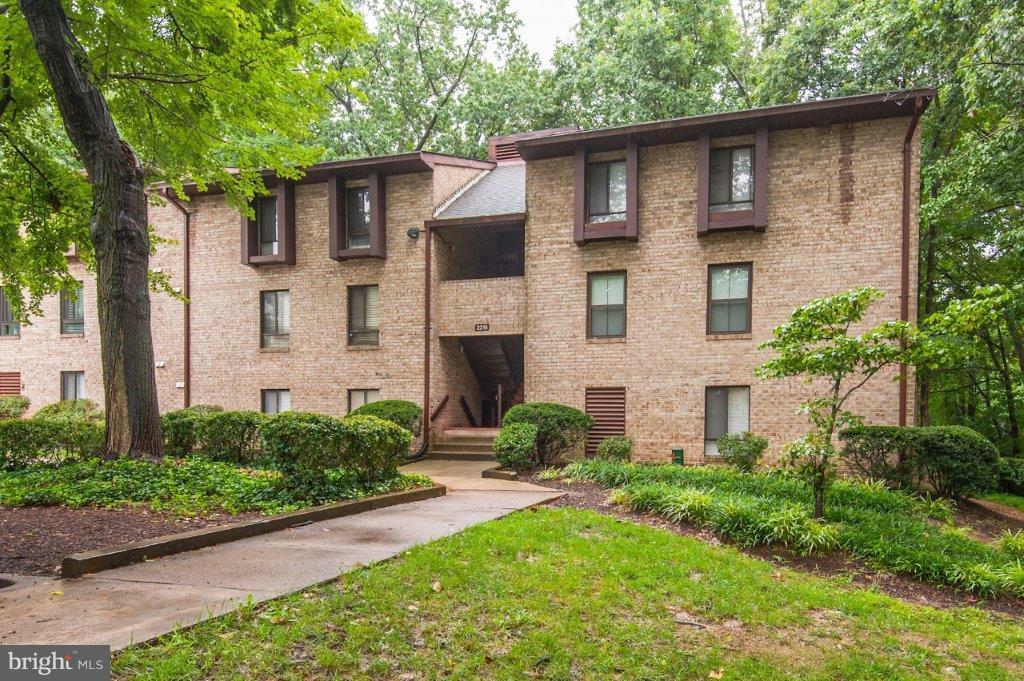 Beautiful Ground Level End Unit - Two Bedrooms w/brand new carpet - Updated Kitchen w/Stainless Appliances - Two Full Updated Bathrooms - Large LR w/Formal Dining Space and Sliding Glass Doors to Back Patio - Backs to Trees- Reserved Parking Space & Plenty of Guest Spaces - UTILITIES INCLUDED - Outdoor Pool & Tennis - Close to Silver Line - Dulles Toll Rd - Fairfax Cnty Pkwy -Town Center-MUST