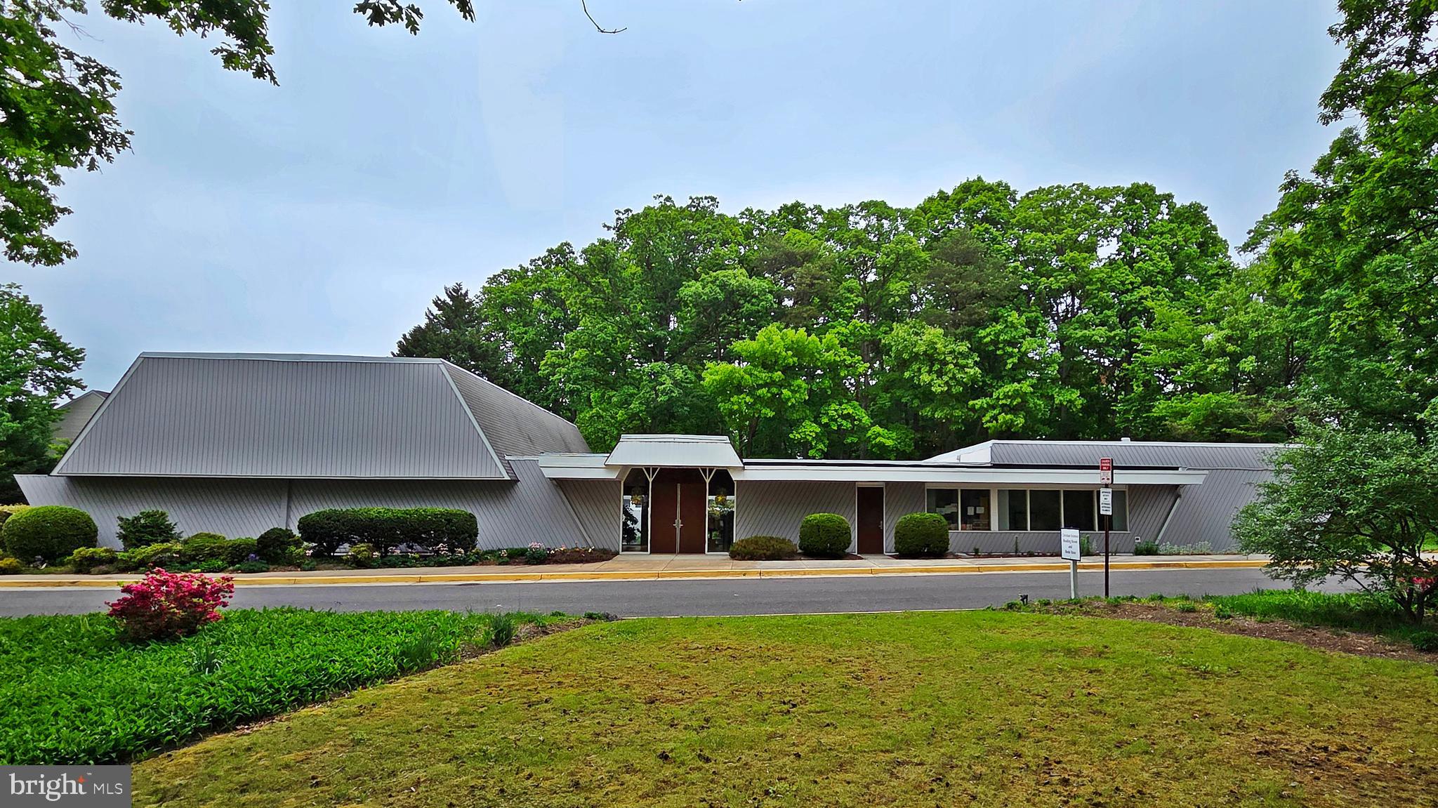 Rare opportunity to acquire a well-maintained 7,524 SF church facility on 2.42 acres in the heart of Springfield. This established institutional property features a distinctive Mid-Century Modern Design, mature landscaped setting, and a highly functional layout ideal for continued religious use or potential childcare, school, or community-service use, subject to applicable zoning approvals. The building includes an auditorium/sanctuary, large multi-purpose room with Cox Business High-Speed Internet & Digital Phone Service, private offices, conference room, and landscaped central atrium, offering flexibility for a variety of programs and events. The expansive site provides 89 onsite parking spaces and a substantial open green area to the south, offering potential future expansion opportunities, subject to approvals. Conveniently located along impressive Backlick Road with easy access to major commuter routes, strong visibility, and a stable residential setting, this R-2 zoned property presents a unique opportunity for an owner/user or investor seeking a well-located institutional asset in Northern Virginia.