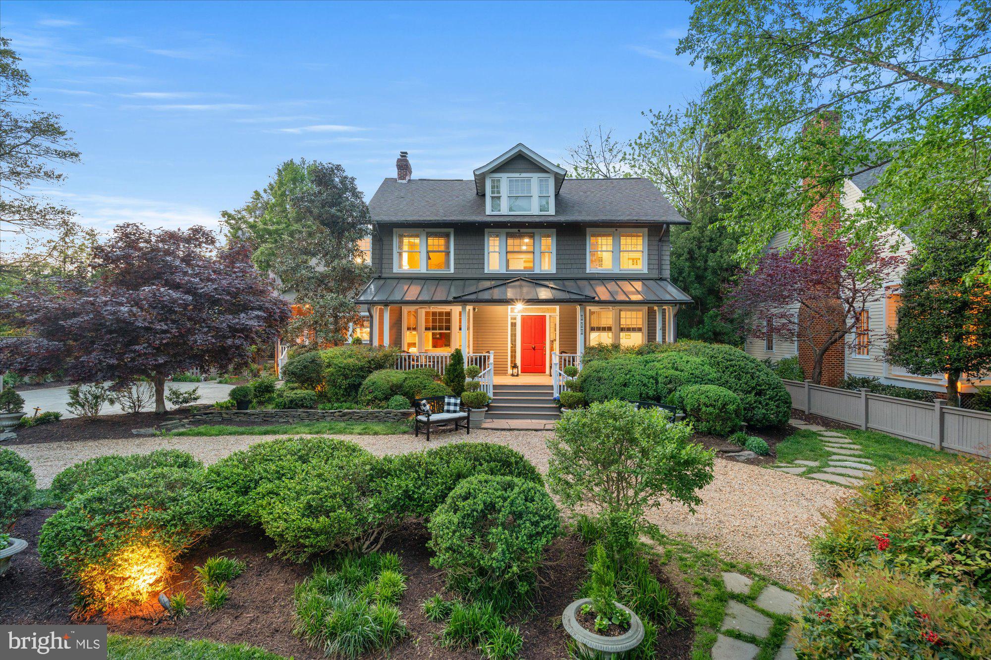 It’s exciting to share a revised value on a truly unique property! This gated in-town country estate offers an unparalleled sense of rural tranquility while being conveniently located just 10 minutes from DCA. Situated on a premier lot on Lloyd's Lane in the City of Alexandria, VA, this almost half-acre property is beautifully landscaped with flower beds and a koi pond, offering an exceptional outdoor living experience.

The entire property is secure and private, enclosed by wood plank fencing with remote gates. A charming front porch welcomes you into an interior filled with character, boasting high ceilings, vintage pine floors, glass doorknobs, and custom details throughout. Rebuilt in 1997, the home exudes a 1925 charm while providing modern comfort and an exceptional layout perfect for entertaining. The owner's meticulous design has resulted in a residence that offers incredible flow for gatherings and peaceful privacy. It even has the potential to host another wedding!

The main floor features a striking thirty-foot art gallery foyer, leading to high-ceilinged formal spaces including separate living and dining rooms, each with a gas fireplace. The updated eat-in white kitchen features a quartz island and overlooks the rear deck and garden. Adjacent to the kitchen is a pantry/mudroom/laundry area and a cozy family room with a fireplace. The study includes a wet bar, and a powder room is conveniently located nearby.

Upstairs, the primary suite is accessed via a foyer that connects two additional rooms (ideal for bedrooms or an office), two bathrooms, and a spacious 14 x 12 walk-in closet. This level also includes two more bedrooms and a full bathroom. On the next floor, you'll find another bedroom suite, an enormous playroom/studio, and a full bath.

The finished lower level offers abundant storage, another bedroom suite with a full bath and a separate exterior entrance (perfect for a nanny or in-law suite), a separate laundry room, and an additional recreation room suitable for games or a screening room. The circular stone driveway provides parking for numerous cars. This prime setting is ideal for children and pets to roam freely, and it's remarkable that this peaceful haven is located in the heart of the city. Moreover, the property offers great convenience to multiple private and public schools and is in close proximity to Old Town Alexandria and Washington, DC.