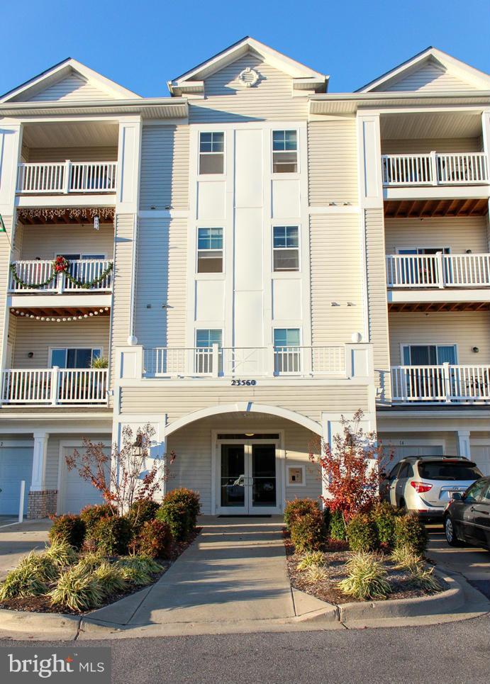Just like new. 3rd floor beautifully appointed unit with 1 car garage! 2 bdrms/2baths with large living/dining combination. Maintenance free living, water and trash included. Access to fitness center and clubhouse. This one is a beauty!