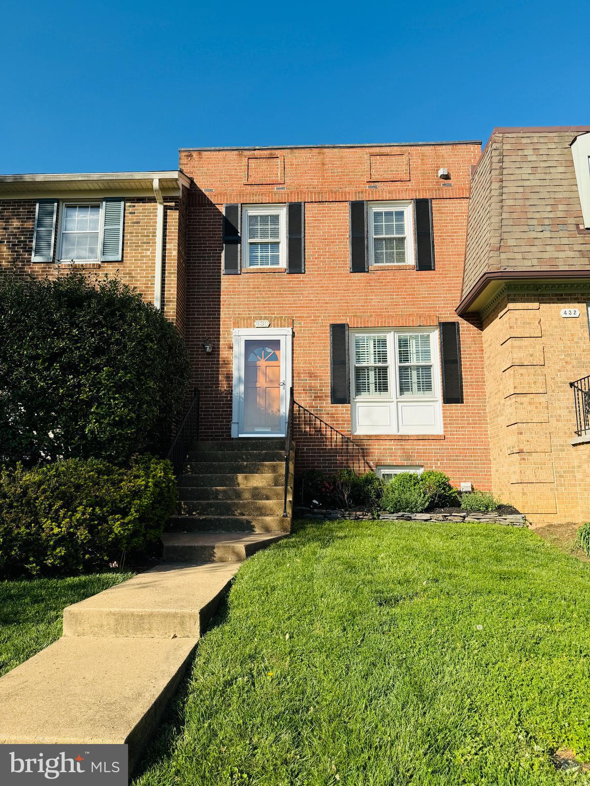 For Rent in the Heart of Vienna! Spacious and light-filled, 3 bed, 4 bath (2 full and 2 half) all brick townhome available immediately. HIGH WALK SCORE! Just steps from the W&OD Trail, the Vienna Community Center and short stroll to Whole Foods,  area restaurants, parks, and more! Freshly painted throughout and featuring updated baths and new carpeting on upper and lower levels, this home offers a perfect blend of comfort and convenience. The main level features hardwood flooring throughout, a living room with built-ins that opens to the dining room, an eat-in kitchen complete with stainless steel appliances, ample cabinet space, and a bay window that brings in tons of natural light. Upstairs, you’ll find three bedrooms, including a primary ensuite, plus a second full bath. Brand new carpeting adds a fresh touch to the upper level. The walk-out lower level offers a versatile rec room with built in shelving, half bath, and a large laundry room with built-in storage, new carperting and french doors that lead to outdoor patio and backyard. One assigned parking spot and numerous visitor spots in front. Trash, front lawn care and snow shoveling are included. James Madison High School Pyramid (Vienna Elementary, Thoreau Middle School).  Minutes to Vienna Metro, Tysons, Mosaic Center, and  66.
