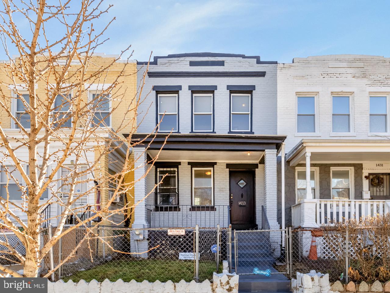 Classic Federal-style row home on a quiet one-way street, perfectly positioned between Union Market, the H Street Corridor, and Ivy City. Whether it's dinner with friends, a concert, a brewery, or a quick coffee run, some of DC's most exciting destinations are just moments from your door.

Inside, the well-maintained home offers hardwood floors, flexible living spaces, and an open main level designed for easy everyday living. The updated kitchen with stainless steel appliances anchors the space, creating a natural gathering spot for cooking, dining, and entertaining.

Out back, a surprisingly large fenced yard offers something increasingly rare in the city: room to spread out. Host summer cookouts, start a garden, let pets roam, or simply enjoy having your own outdoor retreat. Private off-street parking adds another layer of convenience.

Upstairs are three bedrooms and an updated bath, while the finished lower level provides additional living space with a large family room, full bath, and in-home laundry. A classic DC home with the outdoor space you want and the neighborhood amenities you'll actually use. **Special Financing Available, ask for more info.**