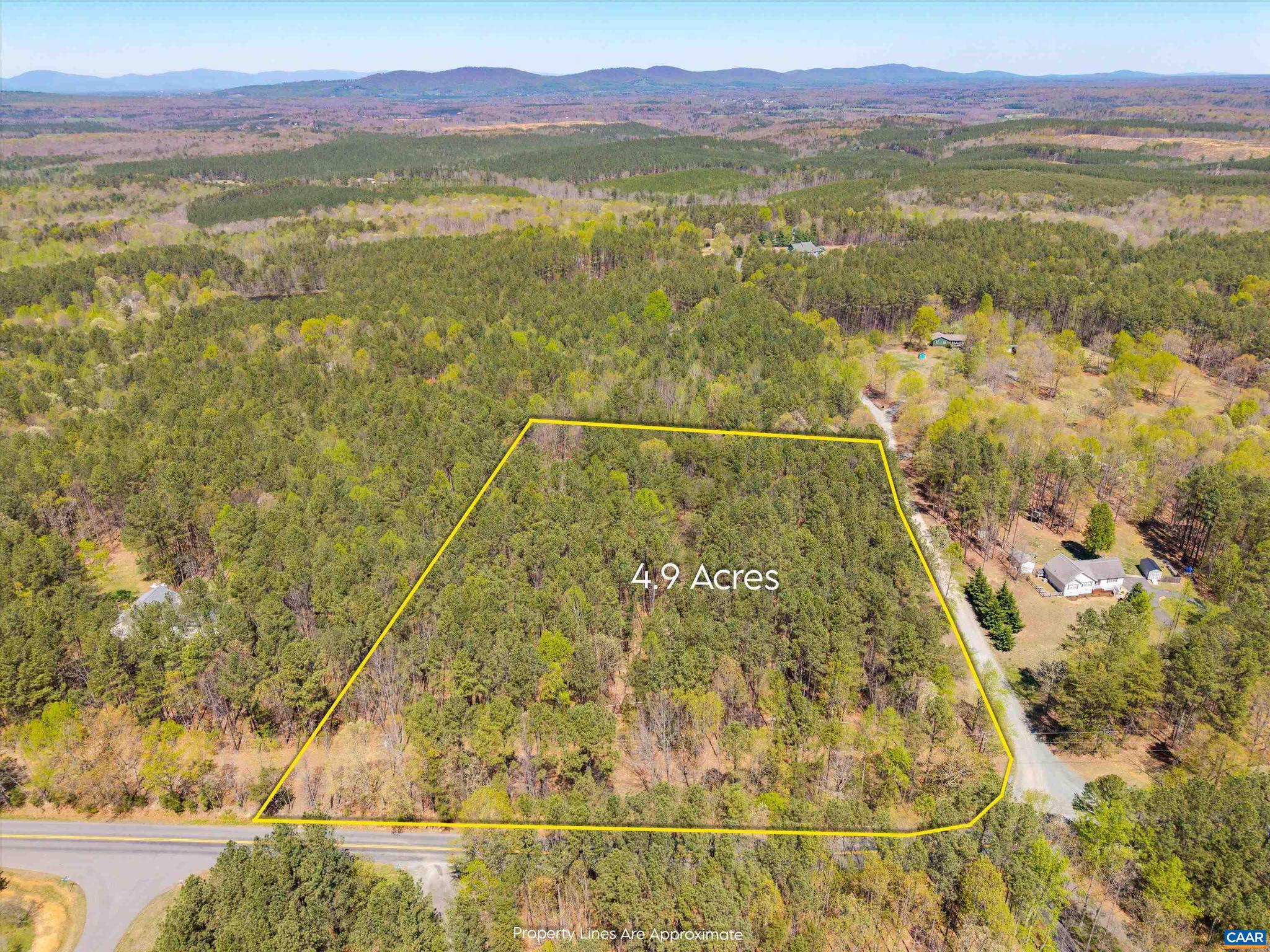 BUILD YOUR DREAM HOME ON 4.9 ACRE LOT IN ALBEMARLE COUNTY!�Discover the perfect canvas for your custom home on this serene 4.91-acre corner lot in the desirable Saddlewood Farms community. Nestled in the rolling countryside of Albemarle County, this buildable parcel offers a peaceful, rural setting just 10 minutes from downtown Charlottesville.  With no HOA restrictions, you have the freedom to design a home that suits your lifestyle, whether you're envisioning a private retreat or a family estate. The property's gentle terrain and wooded backdrop provide both privacy and natural beauty.  Enjoy the tranquility of country living while maintaining convenient access to city amenities, including shopping, dining, and entertainment. This is a rare opportunity to create your ideal living space in a prime location.