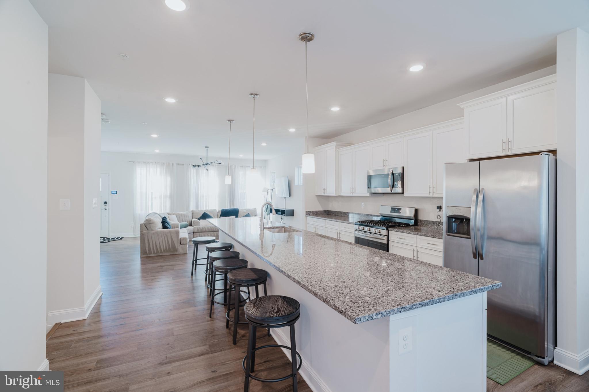 Located just minutes away from Pax River Naval Base.

Welcome to 45397 Englewood Way, a stunning 3-level, 3bd, 2 full/2 half bath, end-unit townhome that perfectly captures the essence of modern living in California, MD. Built in 2020, this 6-year-old residence offers the pristine quality of a newer build, without the wait!

Situated in the highly sought-after, developing city of California, MD, this home places you minutes from everything. Travel east to experience a plethora of restaurants from dine in to fast food. Minutes away from Pax River Naval Station. Travel West, crossing the Thomas Johnson bridge, is where you’ll find Solomon’s Island, famous for some of the best seafood in Maryland. A little over an hour from Washington D.C. and also Northern Virginia.

Interior Highlights:

- Gourmet Kitchen: Features a massive 14 foot granite island, stainless steel appliances, crisp white cabinetry, and walk-in pantry. 

- Spacious Layout: 3 bedrooms and 4 bathrooms across three sun-drenched levels, offering plenty of room for a home office or guest space. Finished basement, including newly installed LVP.

- Designer Details: Enjoy high-end touches like the custom dry bar with a wine storage.

Residents of The Woods at Myrtle Point, enjoy exclusive access to amenities such as an Early Child Development Center, community pool, playground, also Myrtle Point Beach.

Welcome home!
