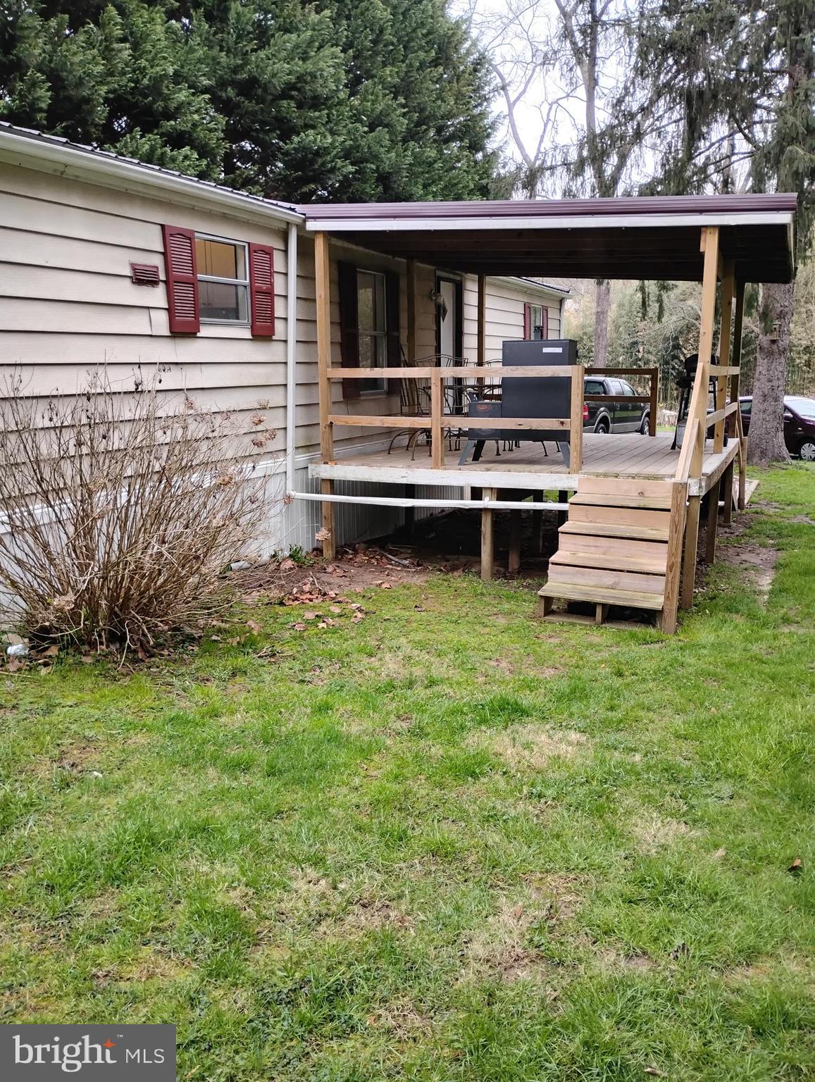 This 3 BR, 1.5 bath single wide manufactured home is being offered for $60,000.  Situated in a nice, quaint park that you would love to call home.  Buyers must be park approved.  Included is a pellet stove, 12x12 -  4 year old shed, electric stove, refrigerator, washer, dryer, new roof, 12x20 - 3 year old deck.  You can sit and relax on the deck and watch nature.  There is a $420.00 a month ground rent / park fee.