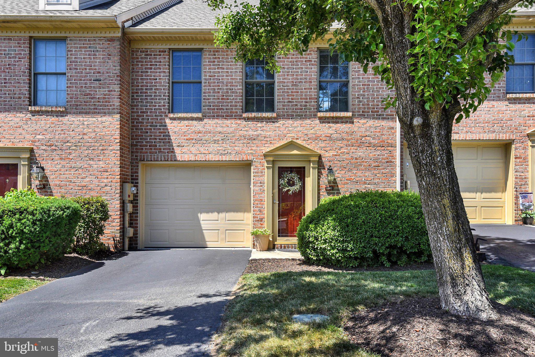 Move right in to this lovely brick 2 story townhouse/condo in Cumberland Valley School District.  Upgrades since ownership include but are not limited to: Luxury Plank Vinyl flooring in the living room, dining room, hallway, main level 1/2 bath and primary bath and new vanities in the primary bathroom and 1/2 bath and new Garage Door and Opener, newer garbage disposal and dishwasher.  ALL of the appliances remain in the property.  This home has been lovingly maintained over the current owners' 4 years here.  The HOA includes: snow removal, lawn and shrubbery maintenance, common area upkeep, exterior doors and garage doors, roofing, gutter and downspout maintenance and replacement when needed, so you can enjoy stress-free living.  (HOA documents are found in the Associated Documents attached to this listing.) The patio to the rear of the home is private with a tree-lined view making a personal relaxing experience or for entertaining your friends/family.  The homeowners have truly enjoyed living here with all of the conveniences of shopping, dining, easy access to all major local highways and UPMC Hospital.  Schedule your tour soon!