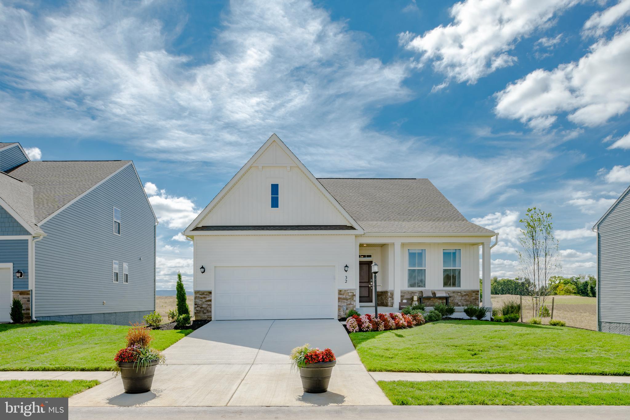 EXPECTED DELIVERY SEPTEMBER 2026! Welcome home to this beautifully designed single-story residence offering 3 bedrooms, 2 bathrooms, and 1,810 square feet of thoughtfully planned living space. The open-concept floor plan seamlessly connects the spacious Great Room, gourmet kitchen, and breakfast nook—creating the perfect setting for everyday living and entertaining. The kitchen features elegant White Ornamental granite countertops, ample cabinetry, and a large island for gathering with family and friends.
   The versatile breakfast nook provides the perfect space for casual dining and can easily be used as a cozy home office, homework station, or hobby area while remaining connected to the heart of the home. A formal dining room just off the foyer offers an elegant setting for holiday meals and special occasions.
    The luxurious owner's suite is privately situated on one side of the home and features a spacious walk-in closet and en-suite bath. Two secondary bedrooms and a full bath are located on the opposite side of the home, providing comfort and privacy for family members or guests.
   Additional highlights include a convenient laundry room, covered front porch, and attached two-car garage. With its functional layout, modern finishes, and flexible living spaces, this home is designed to fit today's lifestyle.
   Located in the charming city of Charles Town, WV, this home offers convenient access to shopping, dining, outdoor recreation, the scenic beauty of the Shenandoah Valley, and the area's rich historic attractions. Commuters will appreciate the Duffields MARC Station, located just eight miles away, providing easy access to major employment centers throughout the region.