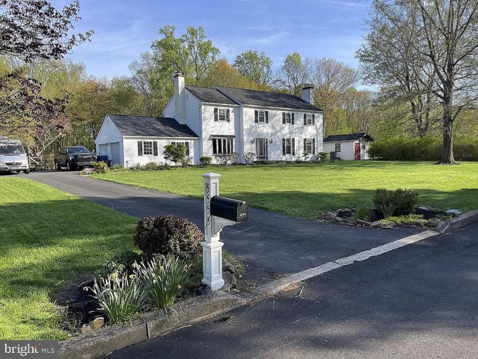 Nestled in the serene community of Indian Springs, this charming Colonial-style home offers a perfect blend of comfort and convenience. Set on a generous 1.1-acre lot, the property adjoins open space, providing a tranquil backdrop for your everyday life. The cul-de-sac location enhances the sense of privacy and community, making it an ideal retreat for those seeking a peaceful environment. As you approach the home, the inviting exterior, framed in classic materials, hints at the warmth that awaits inside. Step through the front door and discover a spacious layout that boasts 2,700 square feet of potential. With four well-appointed bedrooms and two and a half bathrooms, there's ample room for relaxation and entertaining. The heart of the home features two cozy wood-burning fireplaces, perfect for creating a warm ambiance during chilly evenings. The unfinished full basement presents an exciting opportunity for customization, whether you envision a recreation room, home gym, or additional storage space. The main floor laundry adds to the convenience of daily living, allowing you to manage chores with ease. Outdoor living is a highlight of this property, with a personal in-ground pool that invites you to enjoy sunny days and warm evenings. The expansive patio area is perfect for hosting gatherings or simply unwinding after a long day, while the additional shed provides extra storage for your gardening tools or outdoor equipment. Parking is a breeze with an attached garage that accommodates two vehicles, along with a spacious driveway for guests. The asphalt driveway ensures easy access year-round. Living in Indian Springs means you're just moments away from local amenities, including shopping, dining, and recreational opportunities. The neighborhood is known for its friendly atmosphere and well-maintained surroundings, making it a wonderful place to call home. Embrace the lifestyle you've always wanted in this delightful home, where comfort and convenience come together beautifully.