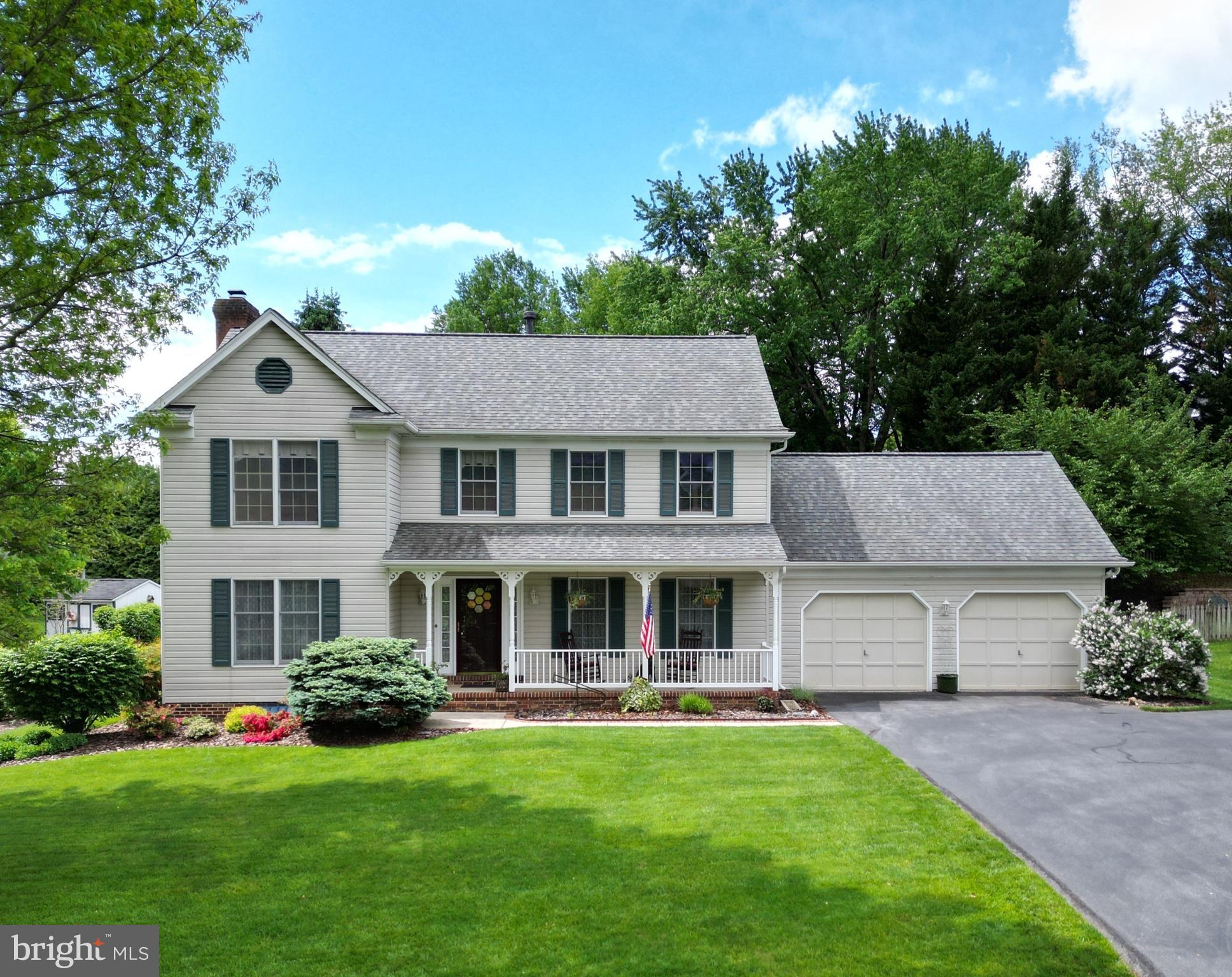 Welcome to this amazing Clover Hill III custom colonial with fabulous location – on a private street three homes away from the Clover Hill Park. This spectacular property features a gourmet eat-in kitchen with peninsula island & breakfast bar, stainless steel appliances, lovely custom cherry cabinets, Silestone countertops, ceramic tile floors, and a spacious pantry with pullout organizers/shelves.  The kitchen is adjacent to the casual dining area with ceramic tile floors and overhead lighting and is open to the family room with floor-to-ceiling brick hearth fireplace with gas log, chair rail and crown molding.  Also on the main level are formal living and dining rooms, each with gleaming hardwood floors and custom moldings.  Rounding out the main level is a convenient powder room and additional laundry closet, each with ceramic tile floors.  Upstairs features the primary bedroom with hardwood flooring, plantation shutters, walk-in-closet with organizer system and private ensuite bath with ceramic tile floors and Corian counters.  The upper level also has three large bedrooms, each with gleaming hardwood floors, ceiling fan, and closet organizer systems.  There is also a second full bath upstairs with ceramic tile floors and Corian countertops.  The finished lower level has a huge recreation room with recessed lighting, a bonus/craft room with wet bar, an office/den and large utility & storage rooms. Outside is a large private deck with pergola overlooking the perfectly manicured backyard with mature trees, professional landscaping and lots of room to play.  There’s also a large, convenient storage shed.  Out front is a cozy front porch, perfect for relaxing and watching the world go by. There’s also an oversized two car attached garage with attic storage. There is much to love about this amazing property! Additionally, Clover Hill, Frederick’s premier neighborhood, has a 13-acre private park with community pool, ballfields, clubhouse, pavilion, basketball court, walking trails, and lots of room to play. Meadowside Drive is a small, private street that is not a cut-through road, yet it is also very near the park.  The low-cost HOA dues include twice-weekly trash removal, weekly yard waste recycling during the growing season, twice-annual bulk trash pickups, community pool membership and more. The neighborhood is close to downtown Frederick, restaurants, shopping and is accessible to all major commuting routes, but is outside Frederick City, so there are no city taxes!  The sellers are the original owners of this home, and have lovingly maintained it. The roof was replaced in 2017, the furnace & A/C were replaced in 2012 and the hot water heater was replaced in 2009.  This is an amazing property that won't last.  Hurry!