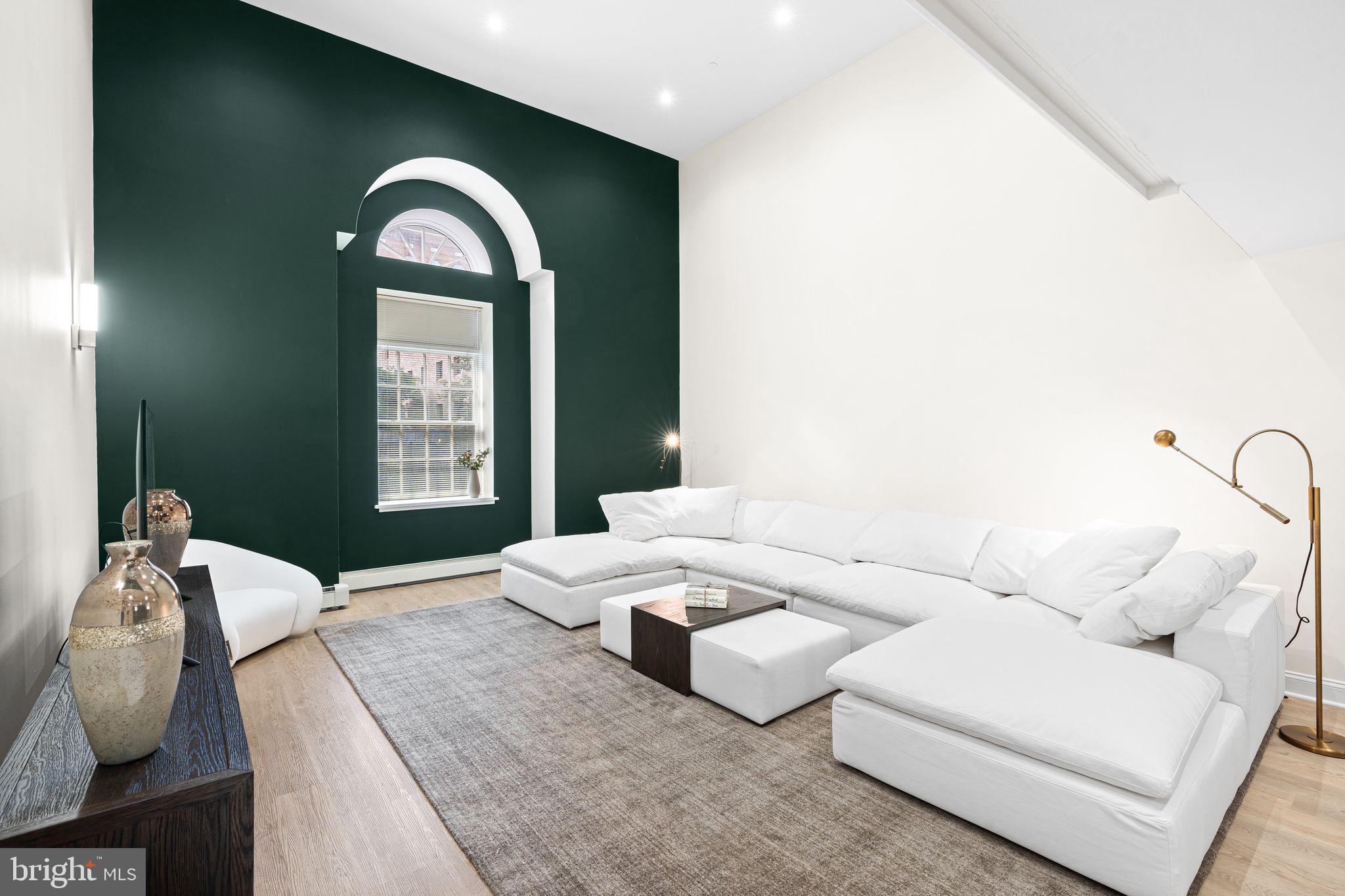 Introducing Unit 104 at The Willings at Independence Park, one of the largest 2-bedroom residences in this storied boutique condominium, set within Society Hill, one of Philadelphia’s most prestigious neighborhoods.
The home opens into sun-filled living and dining areas with hardwood floors, recessed lighting, and west-facing windows that bring in beautiful natural light, especially at sunset. The kitchen follows with stainless steel appliances, ample cabinetry, and a clean, modern layout. Continuing through the main level, the primary suite offers an expansive walk-in closet and spa-like bath featuring a soaking tub and shower. Also on this level are a powder room and laundry room.
Upstairs, the second bedroom overlooks the living area and includes a generous walk-in closet and full bath with a soaking tub and separate shower. A storage room on this level includes a brand-new HVAC unit and hot water heater, both installed in 2025.
The Willings blends strong 19th-century architecture with modern convenience, including concierge service, a 24-hour doorman, deeded parking, a climate-controlled storage unit, and a serene courtyard shared with Old Saint Joseph’s Church. Just steps from cobblestone streets, green parks, theaters, museums, fine dining, and the best of Society Hill, Unit 104 offers exceptional scale, flexibility, and a refined Philadelphia setting.