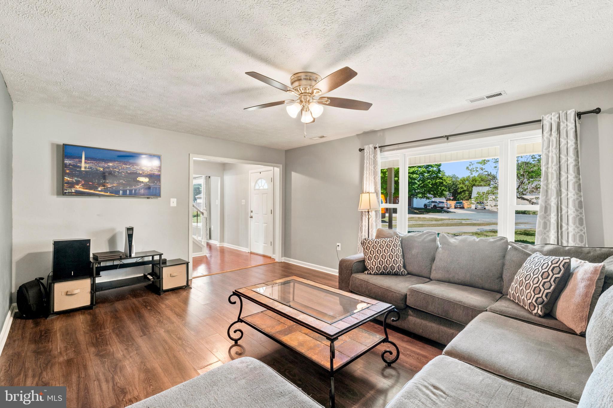 Tucked away on a quiet cul-de-sac in the heart of Albin Village, this charming Cape Cod combines flexible living with a move-in ready finish — and the big-ticket items are already done for you.

The roof was replaced just six years ago, the HVAC and water heater were both replaced in 2023, and every light fixture, ceiling fan, light switch, outlet, and cover was updated in 2024. New LVP flooring was installed in all three bathrooms in 2024, and the laundry room and upstairs hallway received brand-new flooring in 2026. Just move in and enjoy.

The main level offers a rare and versatile bedroom alongside a full bath is ideal for guests, multi-generational living, or a home office. The updated kitchen features a sunny breakfast area and flows seamlessly into a formal dining room, making entertaining effortless. Step outside to your fully fenced, private backyard complete with a patio offers the perfect retreat for relaxing or hosting gatherings.

Upstairs, you'll find two spacious en-suite bedrooms, each with their own private full bath, plus a fourth bedroom and the convenience of an upstairs laundry room. An attached one-car garage rounds out this well-designed floorplan.

Located in Albin Village — a well-established, low-HOA community in Frederick County — you're minutes from shopping, dining, with quick access to I-81 for an easy commute to Winchester and beyond. Nearby Sherando Park offers trails, a pool, sports fields, and picnic areas for year-round outdoor enjoyment.
Schedule your private tour today — this one won't last!