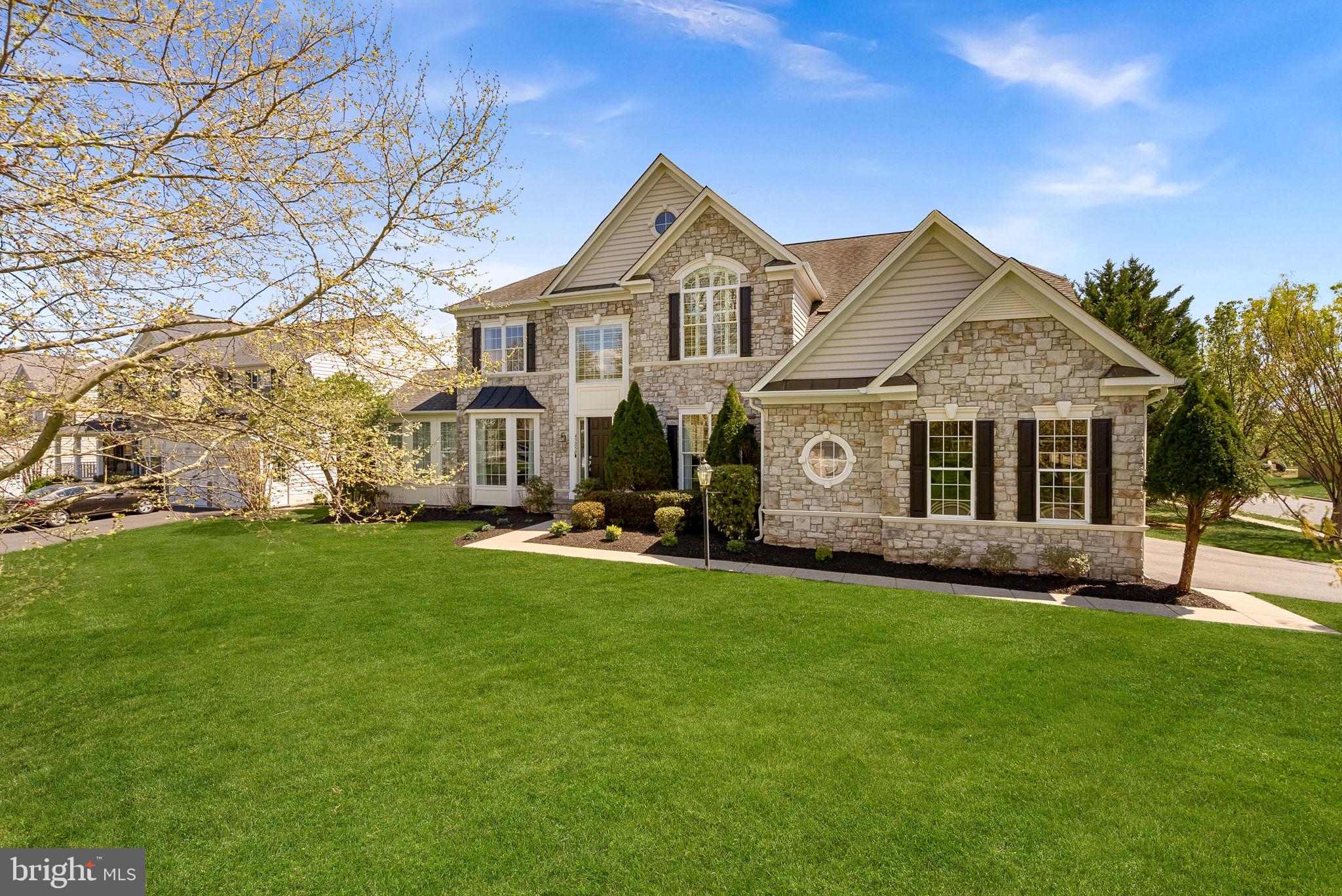 Welcome to an extraordinary residence in the heart of Ashburn, where luxury, lifestyle, and location come together seamlessly.

Situated on nearly 0.70 acres, this fully renovated 6,200 square foot estate offers the rare opportunity to enjoy privacy and resort-style amenities—all while being just a short walk to the Metro, grocery store, restaurants, bank, and dry cleaner. Convenience truly meets sophistication.

Every inch of this 6-bedroom, 4.5-bathroom home has been meticulously renovated with exceptional attention to detail. From the moment you enter, you’ll notice the expansive layout, elevated finishes, and brand-new upgrades throughout—including all new windows, CORETec LVP and Italian porcelain flooring, and stunning 8-foot exterior doors that create a grand, modern feel.

The designer kitchen is a true showpiece, featuring exquisite "Taj Mahal" Quartzite countertops, premium Signature Kitchen Series stainless steel appliances, and Fieldstone cabinetry as well as Italian porcelain flooring—blending beauty with functionality for everyday living and entertaining.

Step outside to your own private retreat. The backyard is an entertainer’s dream with a heated pool and spa, a fully lit sport court, and a spacious Trex deck and patio perfect for gatherings or relaxing evenings under the stars. The expansive lot offers both open space and privacy rarely found in such a prime location.

Ideal for multigenerational living, this home features a fully equipped walk-out lower level with private entrance, including a bedroom, full bath, and kitchenette with full-size refrigerator, dishwasher, microwave, and sink with disposal. A main-level bedroom with closet provides additional flexibility for guests or extended family.

With all-new bathrooms, high-end finishes throughout, and thoughtful renovations at every turn, this home delivers turnkey luxury in one of Northern Virginia’s most desirable communities and school pyramids (Briar Woods/Eagle Ridge/Mill Run)

This is more than a home—it’s a lifestyle.
