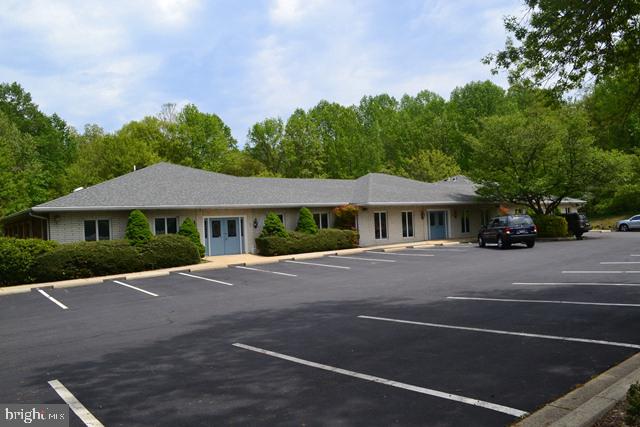 **LEASED CONSIDERABLY LESS SQ FT THAN THE LISTED 2100 SQFR, THUS THE LOWER LEASE PRICE. **

2100 sqft of office space right on Route 4. Outstanding visibility. Has been used as a medical office space, but could easily meet many other medical/professional uses. 6 treatment rooms/offices. Conference rooms, receptionist area, waiting room,3 baths.  If you need less space,  could also lease as two separate spaces,  one that is 1100sq ft and one  that is 1000 sq ft.    This unit is on the lower level with walk in access from the courtyard.  Easily accessible with plenty of parking. Available immediately. Freshly painted.