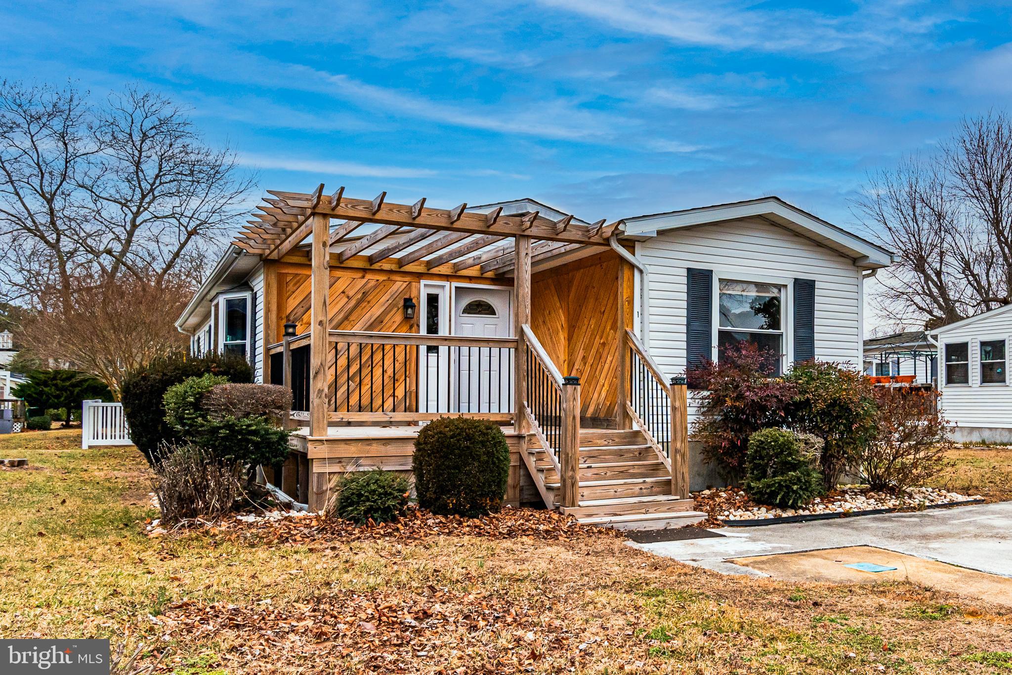 New Price!
Everything Recently Updated.  Three bedroom, two bath home in Mystic Harbor.  Neighborhood  offers residents a variety of amenities including a community pool, playground,  trash pick up,  sport court, and boat/RV storage for homeowners .  The community also has a clubhouse, and homeowners association (HOA) that manages common areas, including snow removal, grass cutting  and trash services.  
Kitchen has all new appliances . stove, refrigerator, dishwasher, and a new sink.  Bathrooms are like new!
New carpet throughout along and hardwood floors in the living room
All new front porch and updated side porch accessed from the kitchen.
Just installed,  All NEW  HVAC system!
This home is like new in all respects.  

 A few minutes from Ocean City,  and Historic Berlin Maryland.  Vacant and available to show anytime.
Call listing agent for access.