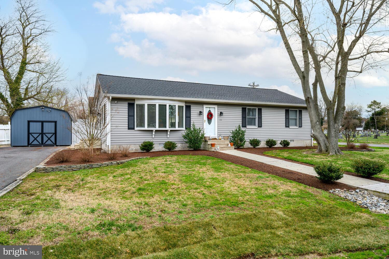 Situated on a corner lot just minutes from downtown St. Michaels, this 3-bedroom, 2-bath home offers easy access to local shops, restaurants, and the Maritime Museum. Inside, the living room is filled with natural light from a large bay window and features LVP flooring, recessed lighting, and updated fixtures throughout. The kitchen and dining area provide an open, functional layout with direct access to the backyard through sliding glass doors. Both bathrooms have been remodeled, and additional updates include new electrical outlets and switches, a 2024 electric panel, HVAC (2025), and a 2026 hot water heater.

Outside, the fenced yard includes a patio, sodded lawn, professional landscaping, and an irrigation system. A 14’x20’ insulated shed with electric and heating/air offers flexible use as a workshop or studio. The home also features a newer roof, siding, gutters, and downspouts  (2 years), plus a 5-year-old encapsulated crawlspace with sump pump and dehumidifier. Complete with a private driveway and well-maintained exterior, this property combines convenience, updates, and location.