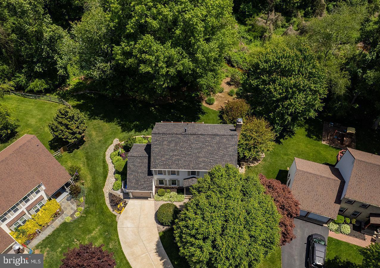 OPEN HOUSES:  Saturday and Sunday, May 30th and 31st, 2-4pm.  
<br>

<br>
Welcome to 9200 Wyeth Lane, an impeccably maintained residence tucked away on one of the best lots in sought-after Southport. Perfectly positioned at the end of a quiet cul-de-sac, this exceptional property offers 4 bedrooms, 2.5 baths, and a beautifully landscaped lot backing to acres of HOA common space, creating a peaceful, private setting filled with nature and wildlife views. Relax on the expansive Trex deck and enjoy visits from birds, deer, and foxes while taking in the quiet beauty of the backyard retreat.
<br>

<br>
This solidly built home has been lovingly cared for and thoughtfully updated throughout. The main level features hardwood flooring and a beautifully renovated custom eat-in kitchen with walls of cabinetry, pull-out shelving, glass-front accents, granite countertops, and an oversized breakfast bar ideal for gathering and entertaining. The kitchen opens directly to the expansive deck, creating the perfect indoor-outdoor flow for everyday living and entertaining.
<br>

<br>

The walk-out lower level offers a spacious rec room with access to a stunning paver patio and hot tub, all surrounded by lush landscaping and exceptional privacy. The lower level also provides significant storage space. Upstairs, you will find four generously sized bedrooms and two beautifully renovated baths.
<br>

<br>
Important Updates include:  Roof (2023), Water Heater (2023), Windows (2020), Deck and Landscaping (2016), HVAC (2013), Kitchen Remodel (2012), Whole House Generator (2012), Primary & Hall Bath Remodeled (2006).
<br>

<br>

Southport is known for its incredible sense of community, with neighbors out walking and running throughout the neighborhood, plus popular block parties, food trucks, and movie nights that bring residents together. The location is outstanding with convenient access to commuter routes, shopping, parks, and everyday amenities. Even better, the home is within walking distance to Lake Braddock Secondary School, serving grades 7 through 12, along with excellent Fairfax County schools.
<br>

<br>
If you have been searching for a home that offers privacy, nature, community, and an unbeatable Burke location, 9200 Wyeth Lane is not to be missed.