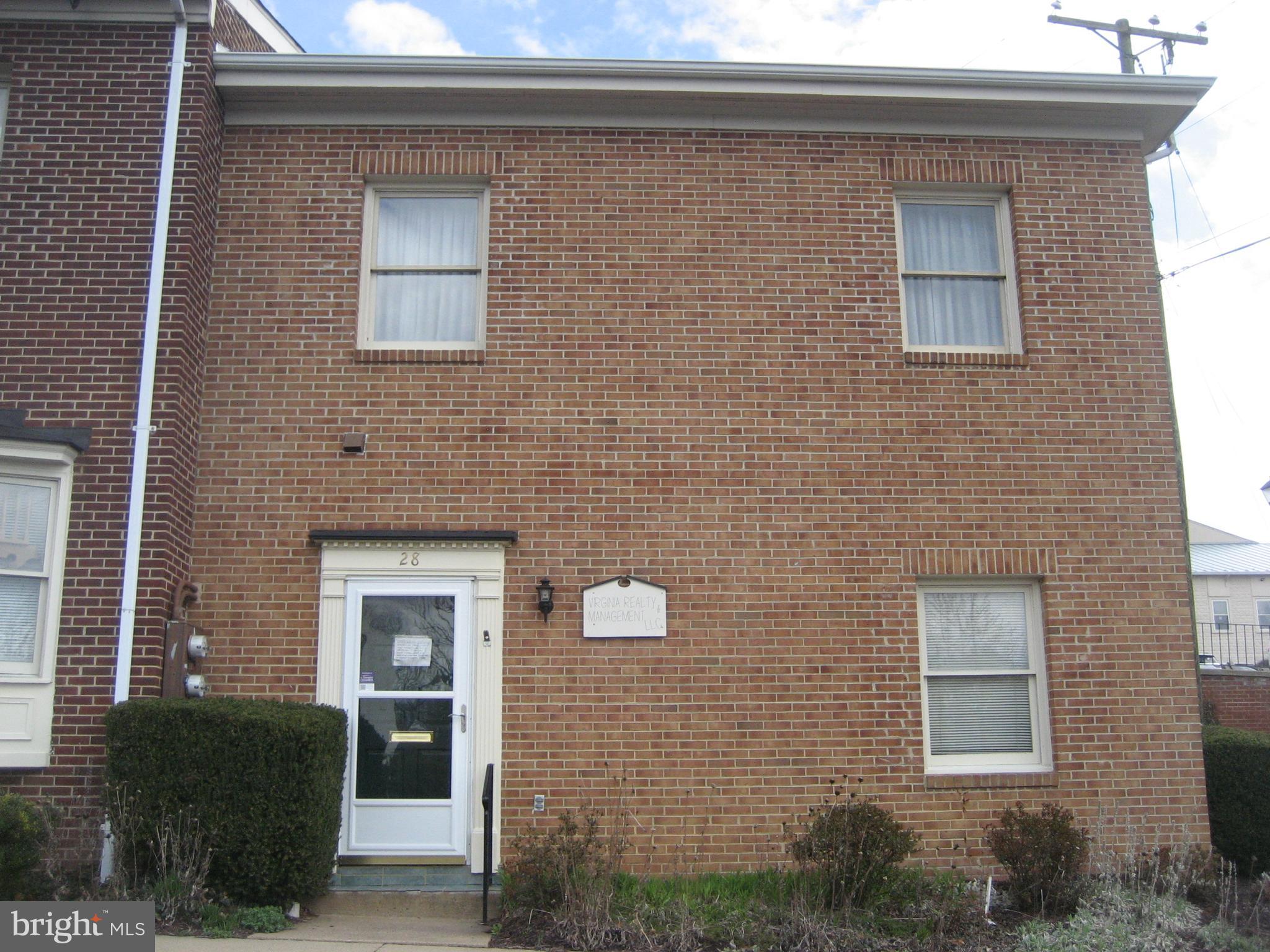 Come check out this office corner condo now fully available for your purchase.  Great location for your office off of Waterloo Street in historic Warrenton within close proximity to Main Street or Fauquier County Offices and other retail and offices in Town.  You can have signage on the building by your door and can have your name on the building directory seen from Waterloo Street.  HOA is very proactive especially when there is snow to have the sidewalks cleared and parking lot cleared. Floorplan will allow you to have a receptionist area and two large offices or you can open it by removing the one division wall to have one large L shaped space depending on your specific needs. One area has built in book shelves for display.  Small kitchnette and half bath.  Great location as unit has direct access within a few steps from parking lot with allowance for two vehicle parking spaces per condo unit designated by HOA.  Do not need to move your car every two hours on John Marshall Street to avoid a parking ticket or park in town parking lots. Well lighted office with multiple windows, three of which are protected by bars for security and privacy.  Many county offices located as neighboring properties.  Prior usages of condo  include real estate office, lawyer office, seamstress and other condo units are various offices or professional services to include hairdresser, construction office, marketing office, etc.  Square footage is assumed to be correct using the tax assessor information.  Buyer should confirm.