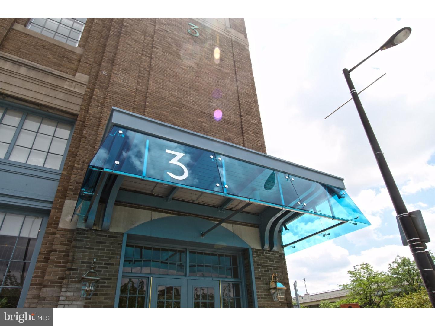 Penn's Landing at Pier 3 = The most unique residential community on the waterfront. This one bedroom, 1 1/2 bath unit is entered from the landscaped, open-air atrium...a world apart, yet so close to Center City. The unit features 14' ceilings and provides a large airy atmosphere with a bright southern exposure in the Atrium. Glass sliding doors open onto your private patio in the atrium - the perfect place for entertaining and for a quiet BBQ after work. The common space on the Pier features relaxing vista to watch the Delaware River with the pleasure boat traffic and tugs pushing freighters of all kinds. First floor features a living room, dining area and a gallery kitchen, laundry facilities and a half bath. The bedroom and master bath are located on the second floor accessed by a classical spiral stair case. Pier 3 boasts an indoor heated pool for enjoyment year round, fitness room and outdoor deck for a front row seat at the fireworks and the beauty of the river. Covered parking, 24 hour concierge, gated community and all outside maintenance are included. Building is wired for Comcast cable and Internet. Basic cable of $37 is added to owners condo bill.  Current assessment will be paid off by owner at settlement