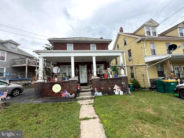 Well cared for East Pennsboro 2 Unit.  Both units are 2 beds/ 1 bath, all Brick Traditional home. Off Street Parking. Level Yard. Large Covered Porch. 2 Hot water heaters, Gas Furnace. Hardwood floors on 1 st floor. Wood burning fireplace on 1st floor.  Washer/ Dryer in the basement. Plenty of storage. Tenant is in 1st floor paying $1,100 a month. Lease ends March 1, 2027. Upstairs apartment is vacant. Tenants moved out and Seller knew he was selling so didn't fill it.
Live in one unit and rent out the other to offset your expenses!! Great long term investment!  Lease available upon request.