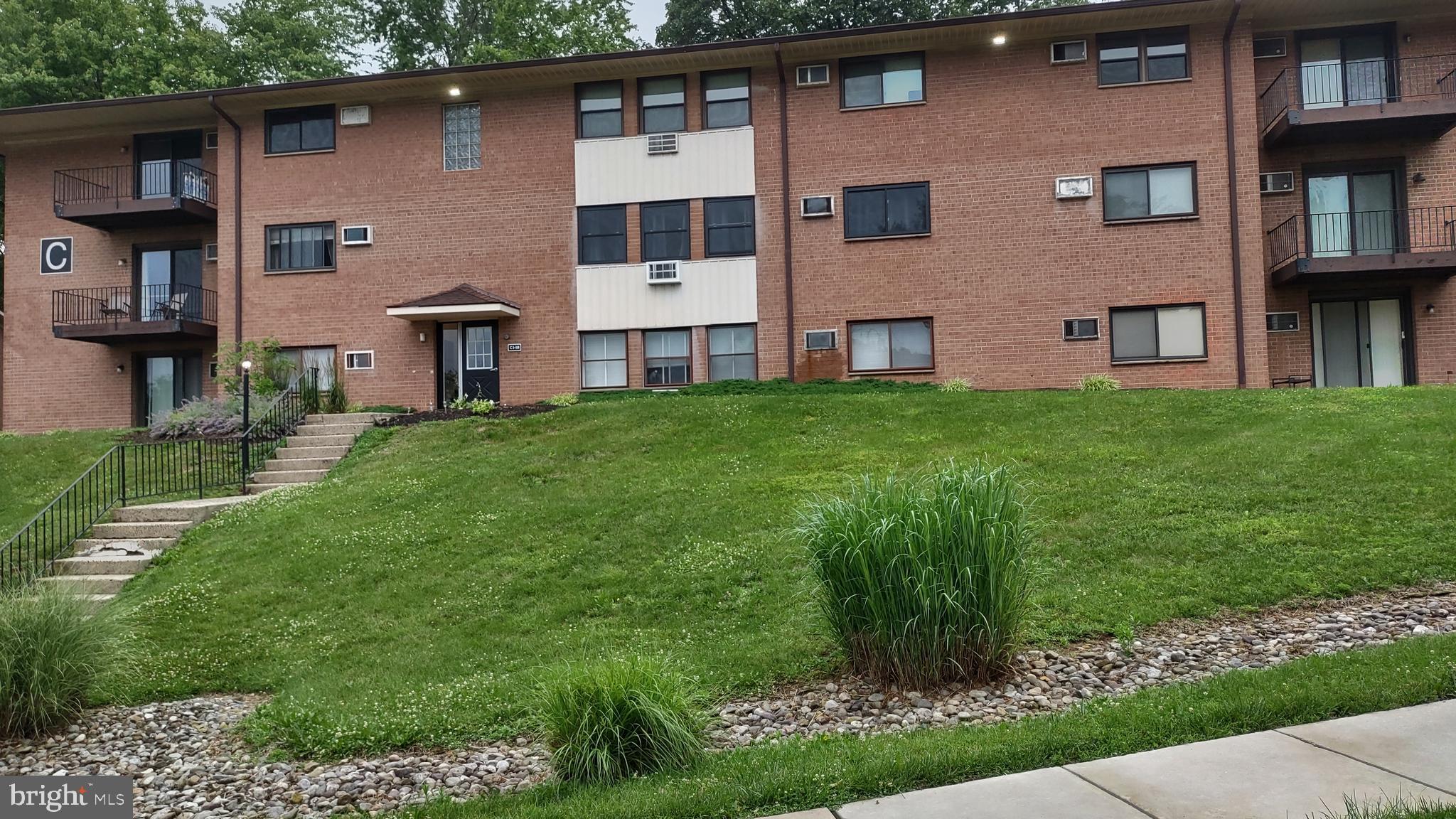 Well-maintained third-floor one-bedroom condo in the desirable Riddle Glen Condominium community!
Perched at the top of the hill, this bright unit offers peaceful views and beautiful original red oak hardwood floors throughout. Features include generous closet space, a private first-floor storage unit, and convenient in-unit laundry with an ultra-compacity washer/dryer that can accommodate queen-size blankets and comforters.

Wall-mounted A/C units provide efficient cooling in the summer and heat during cool spring evenings.
Enjoy maintenance-free living with HOA fees that include heat, hot water, trash removal, snow removal,
and common area maintenance.

Located in the highly rated Rose Tree Media School District and directly across from The Promenade at
Granite Run, with easy access to I-95, Route 476, and Philadelphia International Airport. Property is being
sold contingent upon the seller securing suitable housing.