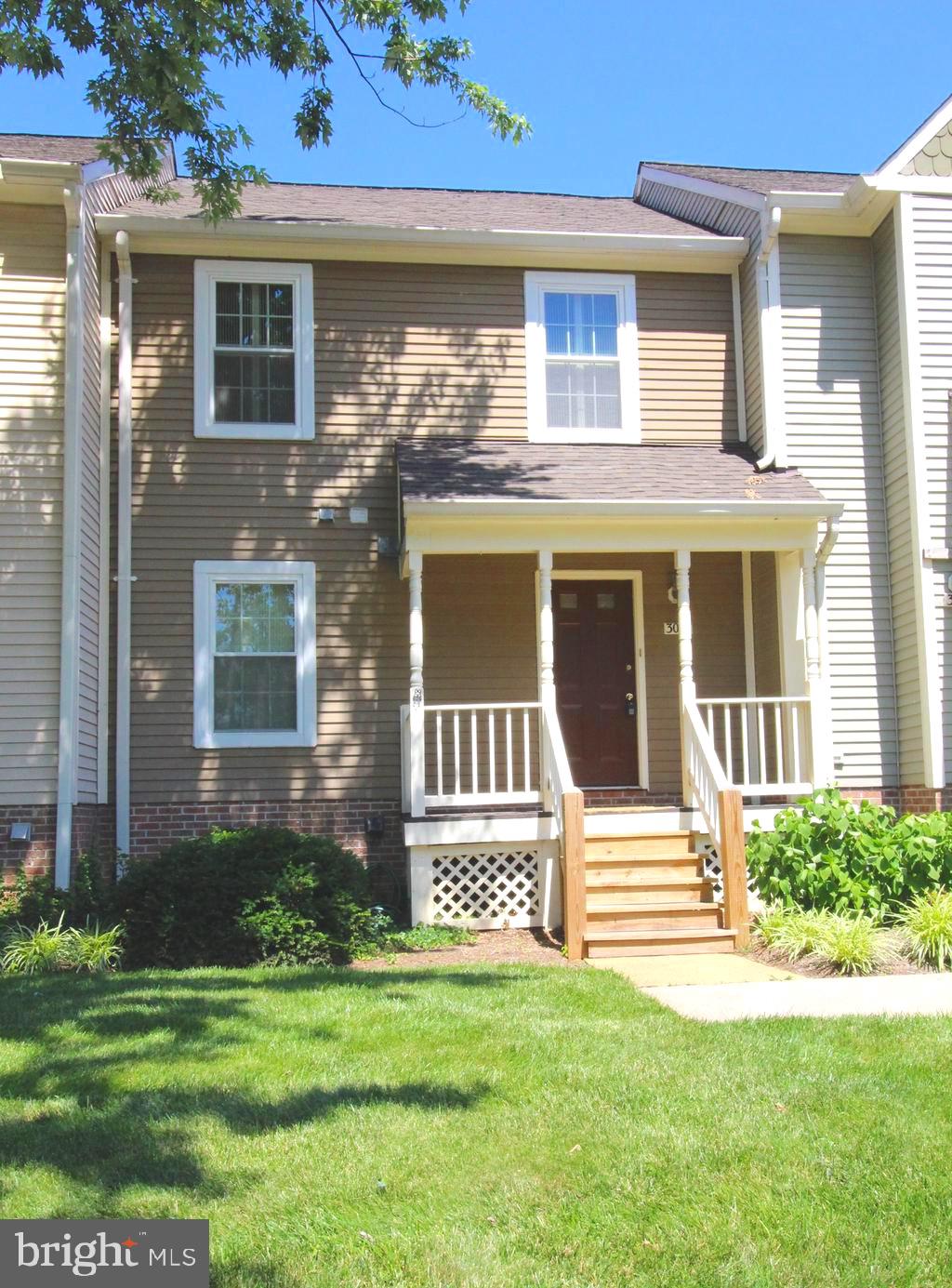Walk to downtown Vienna  Enjoy shops, restaurants, easy access to meto and downtown DC.  One assigned parking  space and plenty of street parking. Charming two level condo  townhome with a cozy front porch.  Access from street side.  Remodeled kitchen with granite counter tops and stainless appliances, neutral carpet and wood floors, three bedrooms and two full plus a powder room on the main level.    Tenant moving out and property available June 1