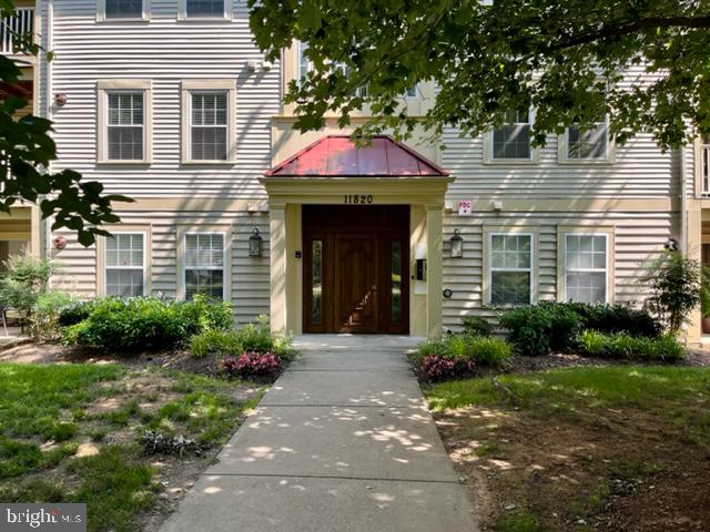 Spacious 2 bedroom 2 full bathroom condo conveniently located in Germantown, MD. This gorgeous unit in a secured building features a living room with a walkout to a private patio space and hardwood floors throughout the entry level. Separate dining room is located adjacent to the kitchen's breakfast bar. This condo has two large bedrooms with the master bedroom featuring an en-suite bathroom and large walk-in closet. The second bedroom has a walk-in closet as well with direct access to an additional bathroom. Full size washer and dryer in separate large laundry room. This ground-level unit has newer carpets in bedrooms and newer hardwood floors in common living areas. This home is a unique blend of an open, sunny space in a secure and private building conveniently located near shopping major highways, dining, entertainment, and more.