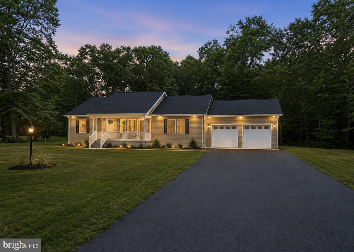 Brand‑new construction in a peaceful country setting! Enjoy effortless one‑level living in this bright, open‑concept rancher designed for comfort and convenience. The spacious living, dining, and kitchen areas flow seamlessly together, creating an inviting space for everyday life and entertaining.

The expansive primary suite sits privately on one side of the home and features a walk‑in closet and a beautifully appointed ensuite bathroom. On the opposite side, you’ll find two additional bedrooms and a full bath—ideal for family, guests, or a home office. A dedicated laundry room adds everyday practicality, and the fully insulated, drywalled two‑car garage provides excellent storage and workspace options.

This is a rare opportunity to own a brand‑new home in a serene rural setting. Make it yours and start enjoying the best of country living with modern comfort.