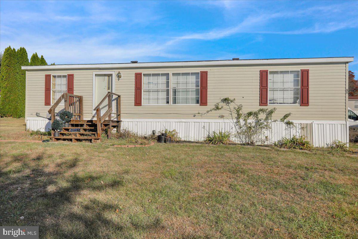 Enjoy the convenience of one floor living with this great Redman home in the Deer Run neighborhood with updated flooring and freshly painted interior. The owner has a new central AC unit, new hot water heater and furnace! Lot rent covers trash, sewage, snow removal and membership to community pool in the neighboring community of Indian Run. This is an excellent opportunity for affordable maintenance free living! Open House Sunday, February 2nd from 1pm-3pm!