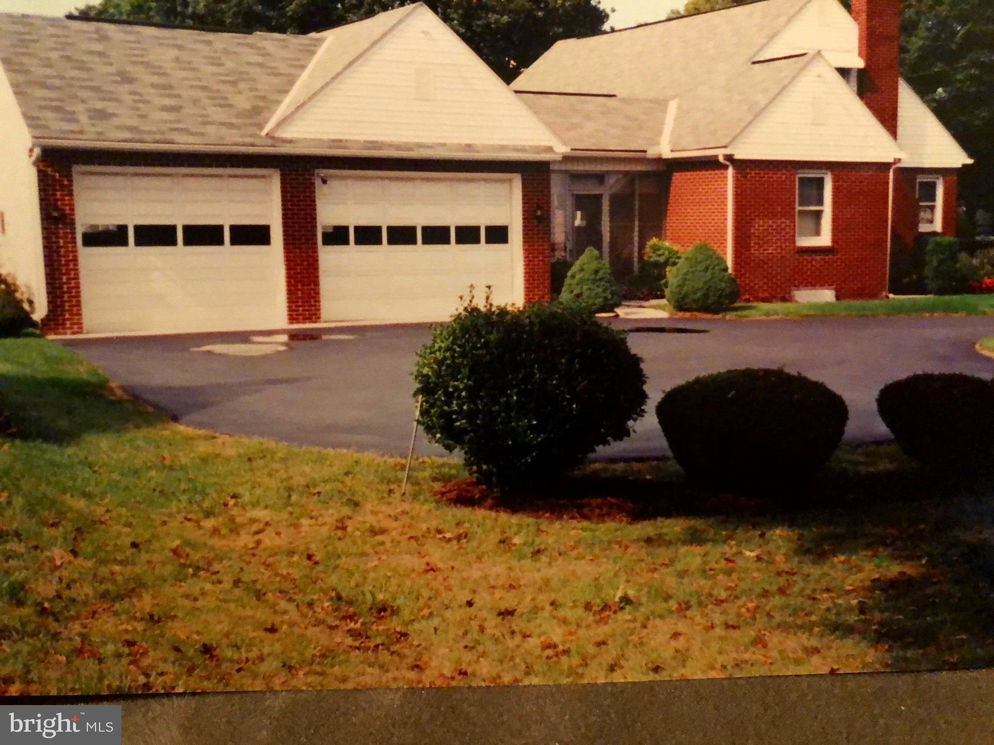 Beautiful Brick Cape Cod*3 Car Garage*Breezeway*Gas Fireplace*Large Corner Lot*Large Windows*Hardwood Floors*Large Deep Closets*Finished Basement* Workshop