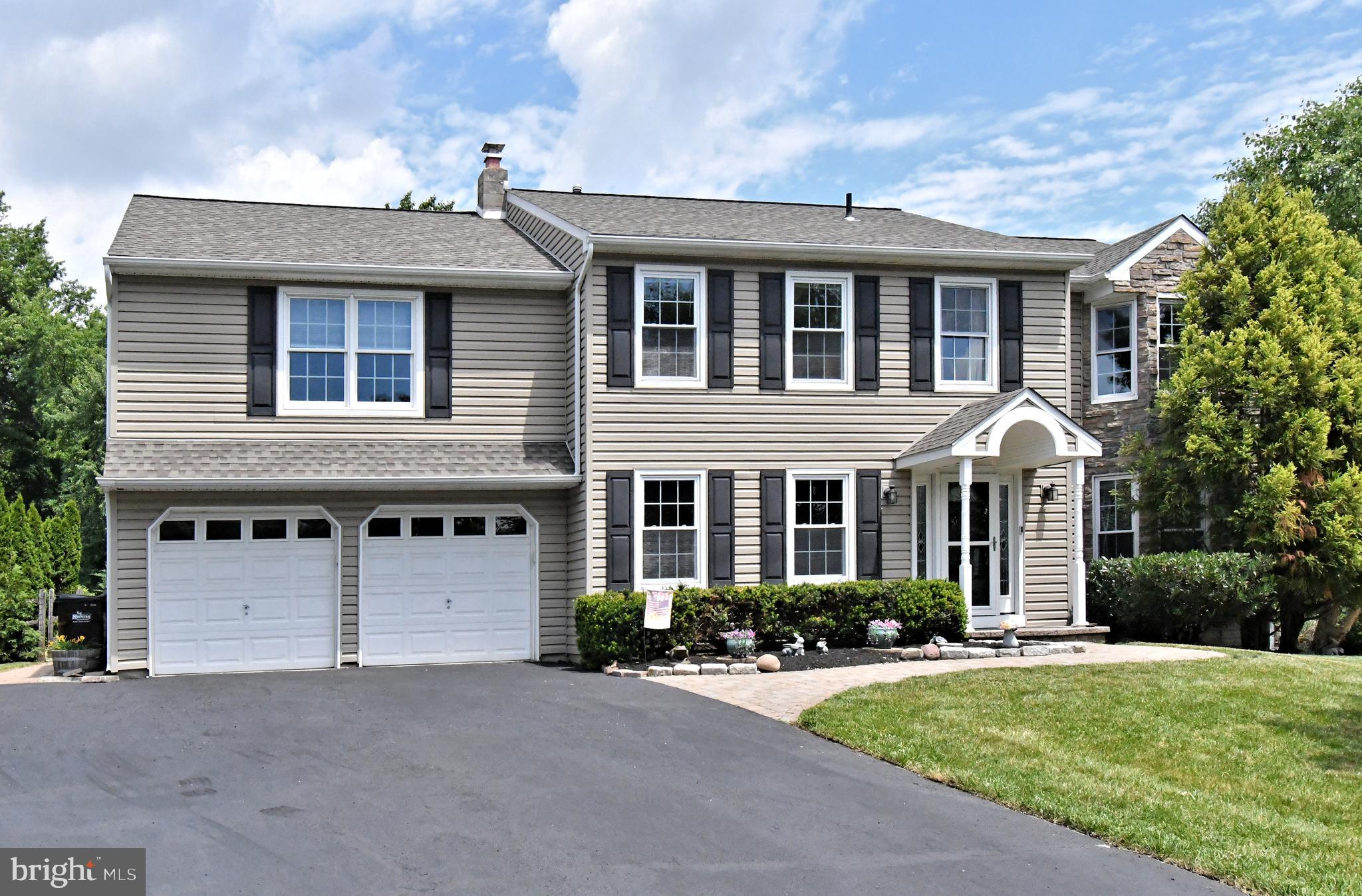 Fabulous opportunity to live in sought after Canterbury on a cul de sac in Montgomery Township! You can't beat this Canterbury Model(largest model in the neighborhood) that has been wonderfully customized with a huge breakfast room and a separate in law/au pair/teenager suite above the garage for extra space or multi-generational living that includes a full kitchen, bedroom, full bath and a living room. Feel the love and feel at home once you walk into the foyer--lovely hardwood flooring and on main floor & all new fresh paint throughout the entire house! "Formal" living and dining rooms are here to be used for whatever suits you best. The huge eat in kitchen offers a center island, granite counters, stainless appliances and the extra special, custom breakfast room with vaulted ceiling & views of the quiet & peaceful yard. Step down family room has vaulted ceiling and a fabulous wood burning fireplace. Heading upstairs, the spacious main bedroom suite offers a walk-in closet with built ins and a full bath.  Three other nice sized bedrooms and the hall bath complete this level.  Back downstairs, find the huge laundry room and here you'll find the steps/private entrance to the in-law suite. It is a great space offering its own bedroom, full bath, full kitchen and living room area with several closets and access to attic storage.  The basement is finished and ready to be the best man cave/gym/playroom around! This fabulous HOME is made even better by the stunning private. fenced in yard with mature plantings and a firepit/seating area. Spring Valley Park is a 5-minute stroll where you will soak in all that is offered---ball fields, walking trail, pavilion, bathrooms, tot lot, tennis courts, basketball courts, sand volleyball court and fresh air. Don't forget that this prime location is minutes from Wegmans, Target, Trader Joes, Planet Fitness, Sprouts, Township Rec Center and so much more. This HOME really is a 5 star winner!
