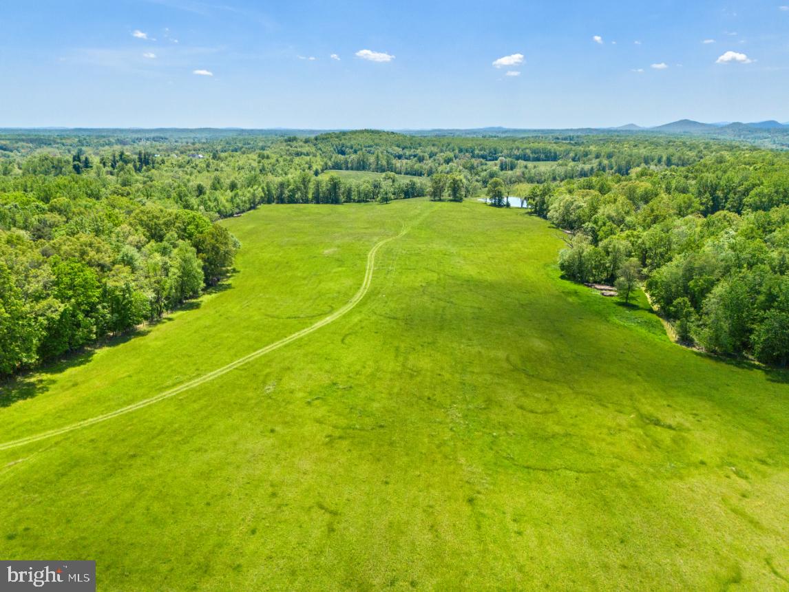 Stunning rolling land with Spectacular views. This 378 +/- acre parcel is protected by a conservation easement with the Virginia Outdoors Foundation. The complete easement can be found in the document section. This parcel is accessed by Kilkenny Road and Hawthorne Farm Road. This land contains a mixture of open pasture and wooded land with a beautiful pond and creek running through the center of the land. This property is located in Prime Old Dominion Hunt territory with tremendous ride out potential. This is truly an exceptional property which encompasses beauty and privacy in every direction.
This parcel potentially has the right for one division. 
The Easement with the VOF allows for the following. 
- 2 Main Dwellings 
-2 free standing dwellings
-2 Dwellings in Barn or Garage
-21,500 sq. ft. of Enclosed Living Space 
-100,000 sq. ft. of impervious Surface