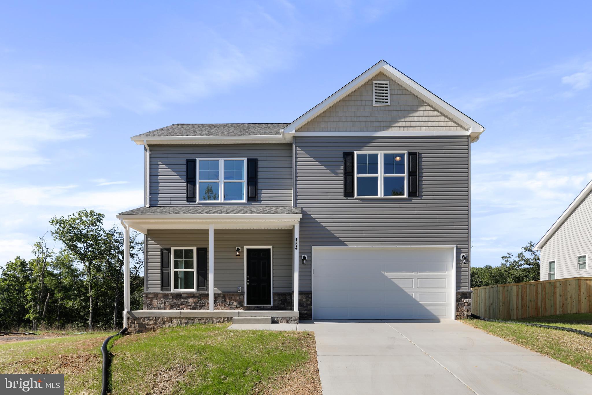 Warfield Homes Inc. has been building custom homes in the Northern Shenandoah Valley for over 30 years. You'll love the openness of the floor plan, the 9' ceilings & the luxury vinyl plank flooring. The kitchen is beautifully finished with soft close cabinets, stainless steel appliances & upgraded countertops. There is a convenient office space on the main level. The spacious owners suite features a stunning tile shower, dual sinks & a walk-in closet. The laundry room is located on the bedroom level. Enjoy morning coffee on the covered front porch. The completion time frame is approximately 6 months from the issuance of the county building permit.