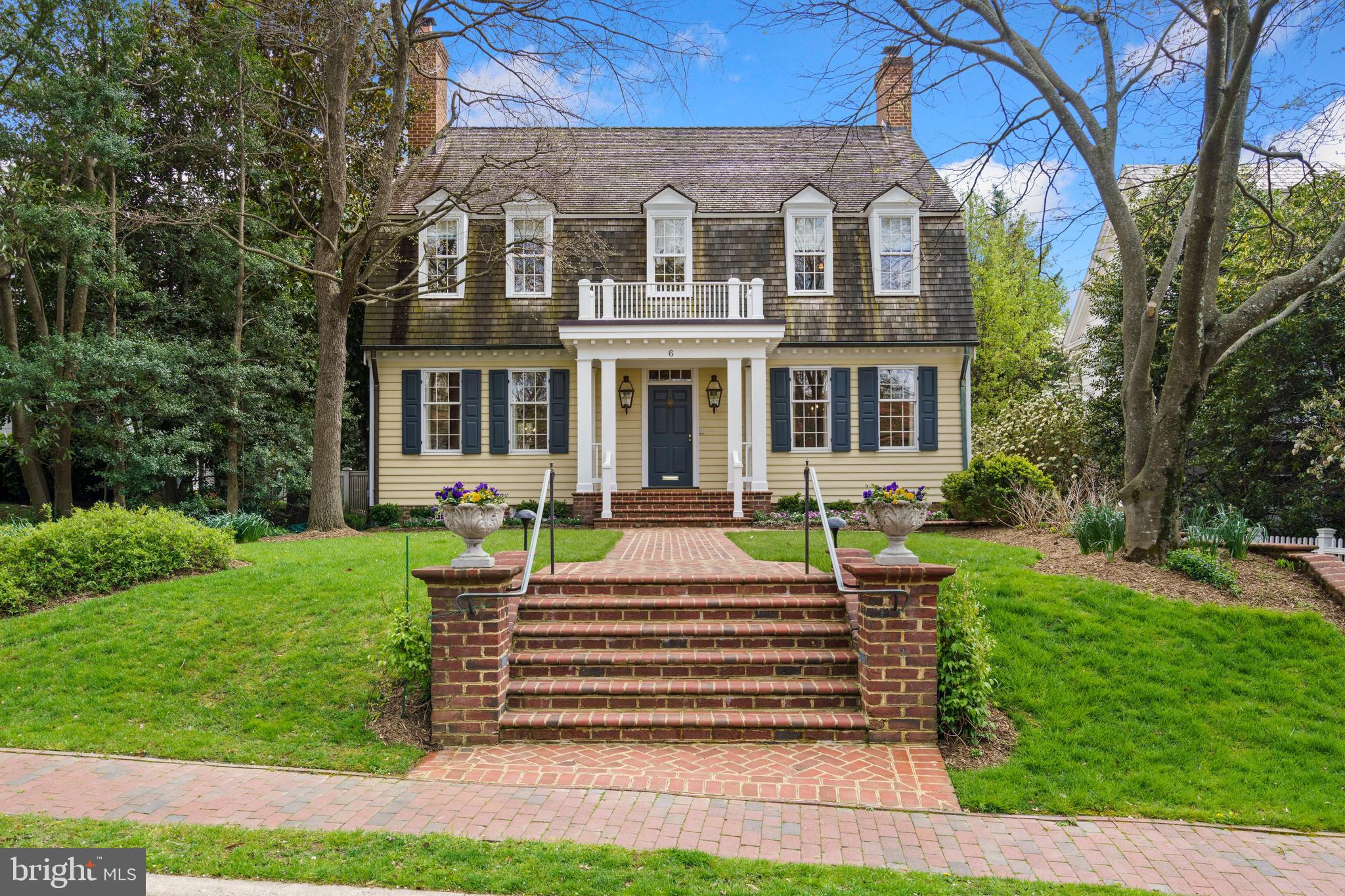 SUNDAY OPEN CANCELED!
Phenomenal opportunity on one of the best blocks of​ coveted Chevy Chase Village! Patterned
after the Nicholson House of Colonial Willamsburg (circa 1750), this home was completed in 1988 and has had only one owner in that time, who has beautifully renovated, updated and maintained it over the years. Much larger than it appears from the street, with approximately 7,000 square feet of livable square footage, 6 Newlands features the scale, finishes and floor plan today’s buyers are seeking.​ A center hall entry opens to a foyer with 9' ceilings, gracious living room and banquet sized dining room, both with fireplaces, gorgeous moldings and detail. Beyond the foyer is the gourmet kitchen with custom inset cabinetry, beamed ceiling, limestone counters, a separate breakfast room with gorgeous built-ins, and a fabulous family room with coffered ceiling, fireplace, built-ins and french doors to the rear. Five bedrooms and three full baths, including a primary suite with fireplace, dual walk-in closets and a sumptuous bath with steam shower and soaking tub are found on the second level. Two additional bedrooms, a full bath and plentiful storage are found on the third level. The lower level includes in-law/guest quarters with two rooms, a full bath and separate entrance, plus a spacious, partially finished recreation room/gym, a large two-car attached garage (able to accommodate an SUV and a full-size sedan), laundry and additional storage. The beautifully landscaped and hardscaped rear gardens are perfect for everyday living as well as full scale entertaining. Additional features include five zone heating and cooling system with state of the art air filtration, irrigation system, custom cabinetry, molding and finishes throughout, high ceilings on each level of the home, and truly meticulous attention to maintenance and detail at every turn. Chevy Chase Village has its own post office, police department and administration, providing residents many amenities, including daily house checks by the police department to households whose members are away, twice weekly trash collection, bulk pick up, numerous community parties, events, activities and more. The shops and restaurants of upper Connecticut Avenue, Friendship Heights, Bethesda and Brookville Road are nearby, as are two Metro stops, many parks and playgrounds, schools and clubs. So close to everything, this location is the perfect choice for those who desire a mature, established neighborhood with all of the conveniences of the city right at hand. This opportunity is a rare find - don't miss it!