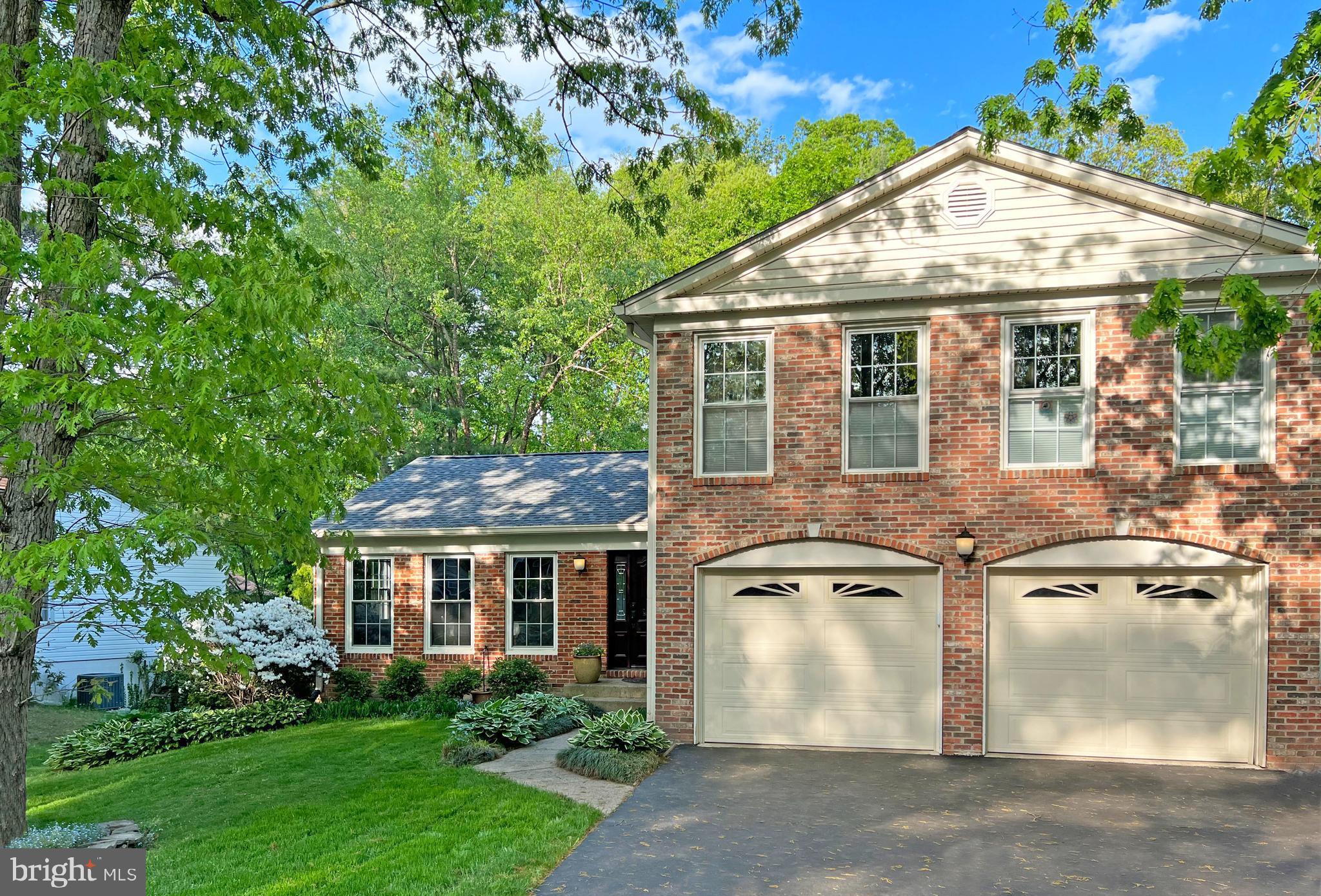 This pampered, updated, and pristine home is located in a quiet neighborhood backing to wooded common area. The flexible floor plan offers a spacious foyer with vaulted ceiling, and ceramic tile with tasteful insets. The living room, has a vaulted ceiling and Brazilian Cherry hardwood. The dining room, also features a vaulted ceiling, Brazilian Cherry floors, rcessed lights, and a Solatube tubular skylight. The kitchen has a vaulted ceiling, cherry cabinetry, granite counters, large island/breakfast bar, and stainless appliances, including a 5 burner gas stove, and Bosch dishwasher. The family room includes a fireplace with black granite hearth and surround, gas logs (convertible back to wood burning), and recessed lighting. 
The family room French doors lead to the 3 season enclosed porch with sliding/removable windows. A new Suntuf transparent roof was installed in 2015, plus a new ceiling fan in 2022. Additionally, a separate deck is plumbed for a gas, enhancing your outdoor living. 
The primary bedroom boasts 3” hardwood, a lighted ceiling fan, and a walk-in closet with Elfa organizers. The beautifully updated primary bath features dual vanities, separate soaking tub & 2022 shower, heated floor, and additional mini-spot recessed lighting. Three additional upper bedrooms also offer 3” hardwood, lighted ceiling fans, and Elfa closet organizers. The hall bath is updated with a skylight, Kohler sink, blue pearl granite, a Toto commode & recessed lighting. The tub surround has large on-trend tile with a listello accent band. The tile floor was new in 2022. The laundry is conveniently located on the upper-level and has a 2022 LG washer and dryer.
The lower level walkout rec room/in-law suite includes a cooktop, built-in microwave, mini-fridge, sink, recessed lighting, and laminate flooring. The fifth bedroom retreat has Elfa closet organizers, recessed lighting, and a ceiling fan. The convenient full bath has an easily accessible shower for mature guests. The storage and utility area houses a Carrier gas furnace with a whole-house humidifier (both 2015) and a 2015 gas HWH. Additional updates include 2014 outlets and rocker-style switches enhancing your new home's functionality and convenience.
Other enhancements include gas conversion, 2017 GAF Timberline architectural roof with 50-year material warranty, oversized gutters and downspouts, vinyl siding, double pane windows, replacement front door, garage doors, driveway replaced & more!  The property boasts a 2-car garage equipped with 2 openers, exterior keypads, utility sink, overhead racks, and a 240-volt EV charging circuit. A 2019 Winco 8,000-watt generator provides backup power with gas line hookup, and transfer switch for 10 circuits, including the furnace and refrigerator. 
 Since summer is just around the corner, many in the neighborhood swim at Fox Hunt Swim & Tennis, a 6 min drive. Other options also a 6 min drive are Hunt Valley Swim Club, and Rolling Valley Swim & Tennis. All this, plus the West Springfield HS pyramid, makes this a top choice! 1.2 miles/3 min drive to Huntsman Park or 16 min walk via paved HOA trail connecting Huntsman Park county trails. Wonderful playground,  paved hiking trails by Huntsman Lake, and basketball courts. 5.4 miles to FREE bus/commuter/carpool parking garage in Springfield at Springfield Community Business Center Commuter Parking Garage. 
1.5 miles/5 min to Sydenstricker Park & Ride, Sydenstricker & Hooes; 170 spaces for FFX Connector #305
Sellers prefer a post settlement occupancy until school is out. Note:  Even though it IS above grade finished sq. ft., the county tax record typically does not include all of the above grade sq. ft. (behind garage in this case) in their calculation of above grade fin. sq. ft. of a split level.  That has been ESTIMATED and included in the above grade sq. footage in the MLS.