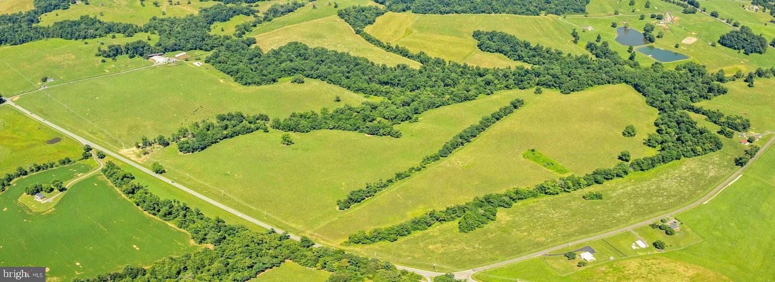 Gorgeous rolling land with spectacular views! Lot 3 is a 241 Acre parcel which cannot be further divided and is protected by an easement with Virginia Outdoors Foundation. For those wanting additional land, Lot 4 with 154 acres, a 3 bedroom home and farm buildings is listed separately for $1,500,000.00. 
For this 241 acre parcel, the VOF Easement allows a permanent single family dwelling, a secondary residential dwelling not to exceed 2,500 sq. ft. of living space and non-residential outbuildings, etc. The complete easement can be found in the documents section.   T.M.#5-14D is a new  Rappahannock County Tax Map number and was part of T.M.#5-14. Rappahannock Co. does not have current assessed values for these new parcels.