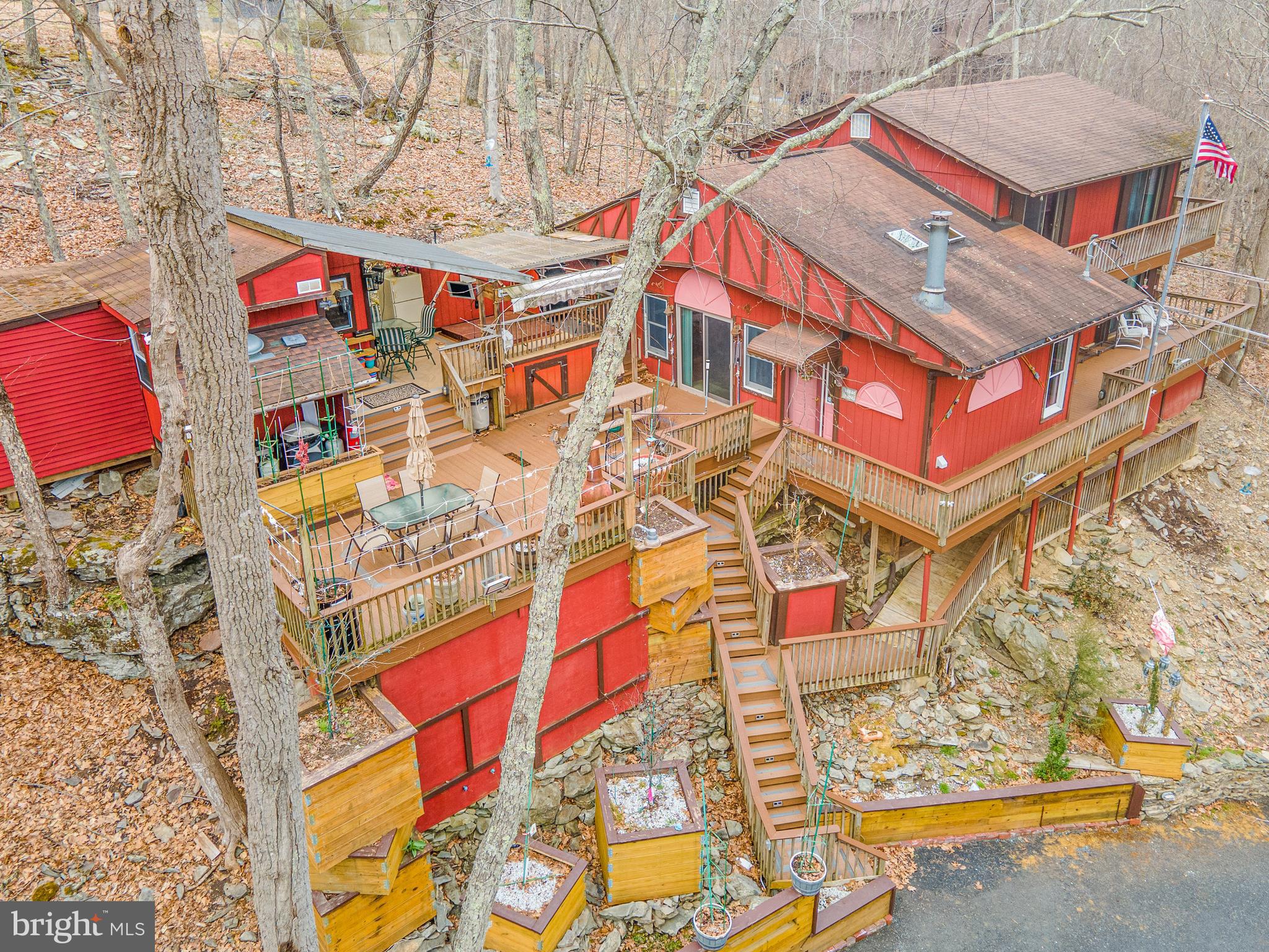 **MOUNTIAN VIEW ACROSS ST FROM The STREAM , Fully Furnished, SITUATED PRIVATLEY ABOVE IT ALL ** This 4 Bed, 3 Bath Home is One of a Kind. Lots of Desirable features such as: Tons of Trex Decking, 3 Sources of Heat, Primary Bedroom suite that includes: Bathroom, Fireplace, Office Room, Huge walk-in Closet & Balcony. Huge Family Room, Sunken Living Room, Workshop, Plant/Laundry Room, Bar Room & Outdoor Hot Tub to Name a few. All Located in a Gold Star Four Season Community, Amenities - Indoor/Outdoor Swimming, Indoor/Outdoor Tennis Ct, Fitness Center, 2 Skiing Trails (they Make their Own Snow), Beach Area, Fishing Dock, pedal boats, row boats, Racquetball CT, Basketball CT, Baseball Field, Playgrounds, Ice Skating & Full Restaurant / Bar. Come Check it out, Schedule your Private Viewing
