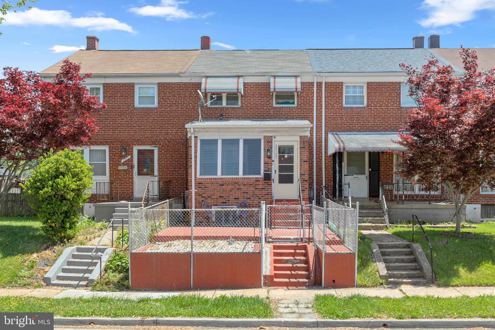 Welcome to 1569 Williams Ave, an all-brick interior townhome in the heart of Essex offering over 1,700 finished square feet filled with character! This home comes with maximized functionally of living spaces both inside and out.

The exterior welcomes you with a gated and fenced brick paver front porch, and a enclosed porch featuring durable LVP flooring—perfect for relaxing mornings or evenings. Inside, the living room showcases hardwood floors and crown molding, creating a warm and inviting atmosphere. The adjacent dining room offers hardwood flooring, white paneled walls, and a ceiling fan, flowing conveniently into the kitchen.

The kitchen features LVP flooring, wood cabinetry, laminate countertops, backsplash, gas cooking stove, and a stainless steel sink with swivel faucet and sprayer for easy cleanup. Just beyond, the mudroom with LVP flooring and blinds leads to a converted sunroom accented with exposed brick walls, ceiling fan, and French doors opening to a covered concrete rear patio with its own ceiling fan—ideal for entertaining. The patio connects directly to the detached one-car garage with additional storage space.

The finished lower level provides a spacious rec room with wood paneling, recessed lighting, and ceiling fan. A soaking clawfoot tub, single vanity, and separate commode area create additional bath functionality. The lower level also includes a laundry area with LVP flooring, utility sink, cabinetry, and walk-up access to the sunroom.

Upstairs, hardwood floors continue throughout. The primary bedroom features crown molding, recessed lighting, and a ceiling fan. A second bedroom and full bath with pedestal sink, wall tile surround, and shower/tub combo complete the upper level. BRAND NEW ROOF (2026)! 

Conveniently located near Rocky Point Golf Course, Middlesex Shopping Center, and the waterfront attractions of Marinas in Middle River. Easy access to Baltimore, major commuter routes including I-695, shopping, dining, parks, and local schools make this a convenient place to call home!