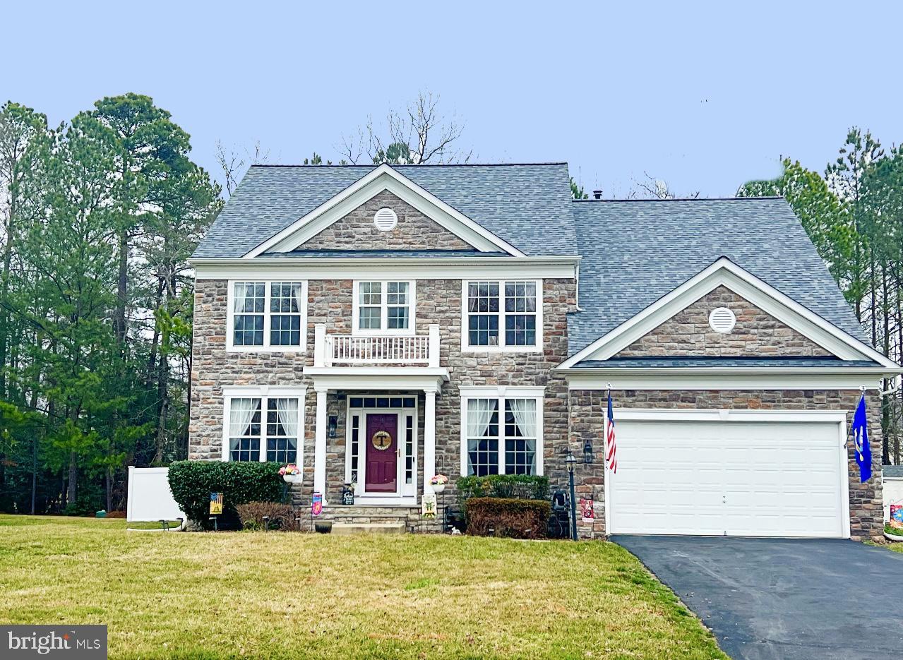 Welcome to your new place to call home! Stunning property in the sought after community of Chatham Village. This home is an entertainer's dream with a fully finished basement and professionally landscaped yard.  Enter through the gracious foyer leading to the classic living room  filled with tons of natural light. The gourmet kitchen  has  beautiful raised- panel cherry cabinetry, backsplash, and granite counters.  Stainless steel appliances include gas cooktop, microwave, dishwasher, double oven and refrigerator/freezer.  The primary suite includes has a cozy gas fireplace, sitting area, and separate his and her closets. The en suite features a double vanity, beautiful tile,  shower, and a large soaking tub.  Two secondary bedrooms share a Jack and Jill bathroom.  Another secondary bedroom has an attached private bathroom. The fully finished basement is perfect for hosting game day! The media/entertainment room has a projector and screen.  A wet bar with lots of counter and barstool space that is perfect for gatherings.  Step outside to a fully fenced in and professionally landscaped backyard.  Just in time for summer, relax by the stunning patio.  The roof is just over a year old.  Great location for commuters and within a five minute drive to Dahlgren.  Check out the virtual tour.  Schedule your showing or plan to attend an open house and make your offer before this home is sold!