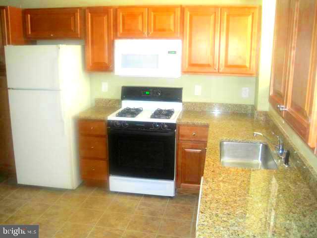 Here’s your chance to own a property in the rapidly developing Westport area. This neighborhood is experiencing exciting growth, with new homes featuring beautiful waterfront views of the Baltimore peninsula. The house is tucked away on a quiet street, just steps from I-295 and the light rail, offering both convenience and tranquility.

Inside, you’ll find an updated kitchen with modern appliances, a full walkout basement with a half bath, and off-street parking for two cars behind a fenced, quiet alley. The property comes with a long-term tenant on a month-to-month lease. The tenant is reliable, has been in place for four years, pays $1,200 per month (plus water), and would love to stay. This is a turnkey opportunity, as the property is lead-certified, has a rental license, and recently passed inspection.

Whether you’re looking for a great investment or a place to call home, now is the perfect time to get into this neighborhood. Schedule your appointment today!
Several homes on this peaceful two-street enclave have already been sold and thoughtfully renovated, highlighting the neighborhood’s ongoing transformation and appeal.