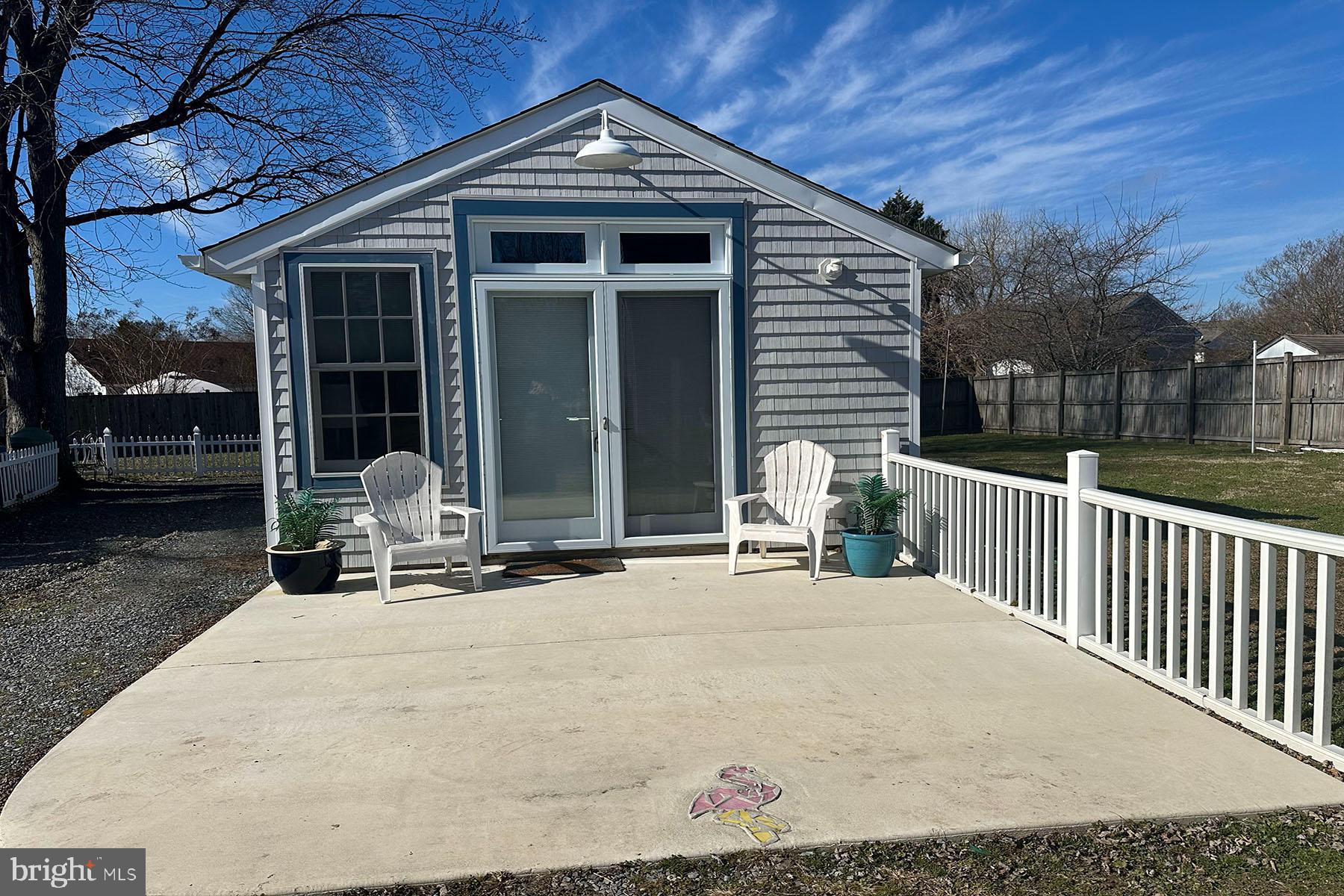 This studio, designed in a Beach Style, boasts excellent insulation that creates a tranquil ambiance. With a vaulted ceiling featuring a ceiling fan, vinyl laminate flooring, and white tongue and groove walls, it exudes a laid-back beach vibe. The bathroom is adorned with a tiled shower equipped with a rain head and handheld spray head.

The amenities include an apartment-sized refrigerator, a 2-burner gas cooktop, microwave, air fryer-toaster oven, and a Keurig. A washer/dryer combo is also provided. The studio comes fully furnished, complete with linens, towels, cooking utensils, dishes, and pots and pans.

Conveniently located near Annapolis and local beaches such as Rehoboth Beach, DE, and Ocean City, MD, it is also in proximity to public golf courses. If you have a penchant for water activities, the Chesapeake Bay and its tributaries, offering opportunities for kayaking, crabbing, and sailing, are just 30 minutes away. The surrounding area features quaint and historical towns like Oxford, St. Michaels, and Cambridge.

For entertainment, Easton provides theaters, bowling, and a variety of restaurants serving steak, seafood, sushi, and more.