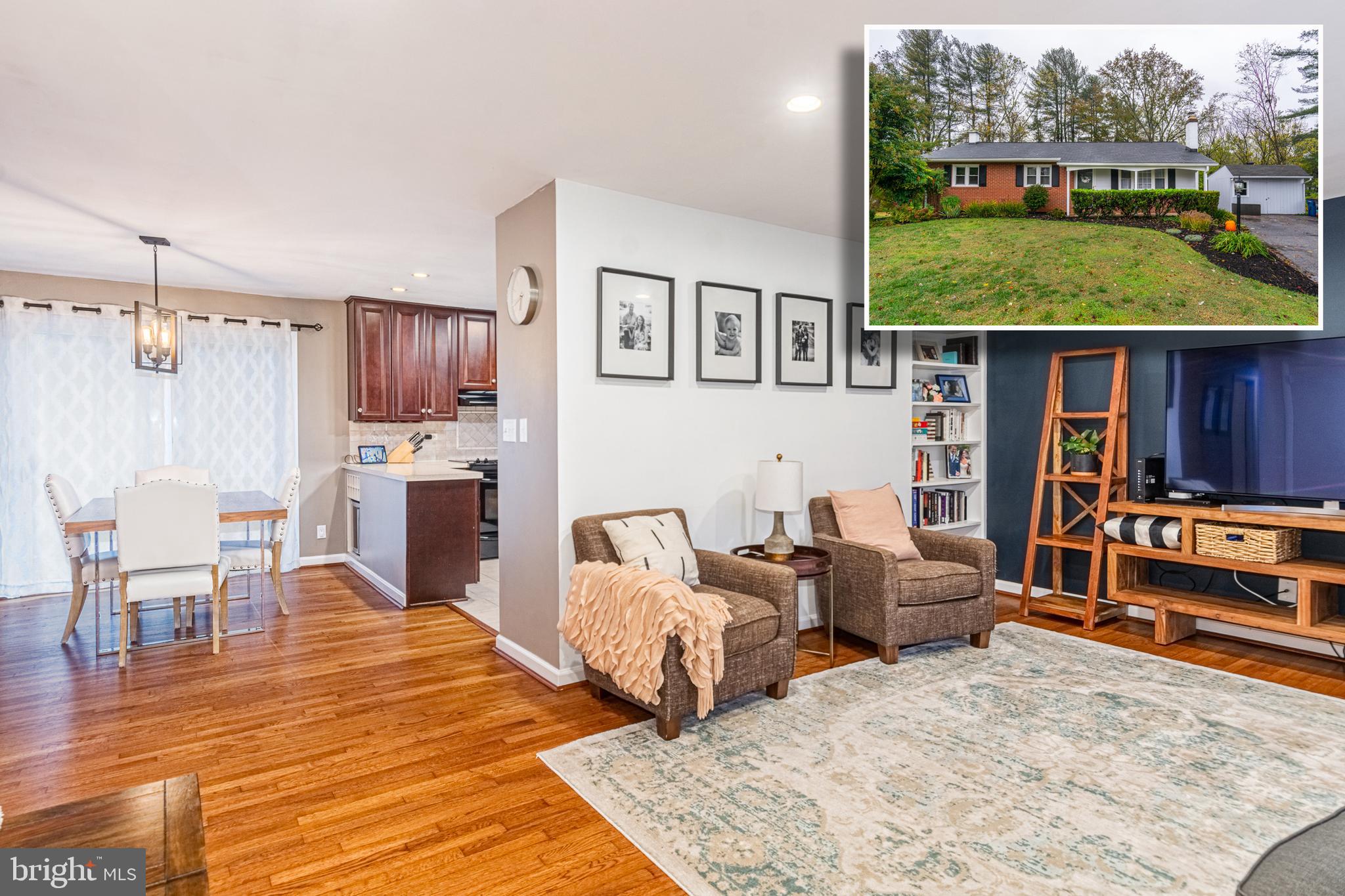 BEAUTIFULLY DESIGNED RANCHER ON A .61 ACRE LOT WITH OVER 1,900 SQ. FT. OF LIVING SPACE!  Features include hardwood floors throughout, an inviting living room and separate dining area, updated kitchen with 42in cabinets, ss appliances, and tile backsplash, 3 generously sized main level bedrooms and a full bath with double sinks, tons of cabinet space, and an attractive shiplap accent wall, walkout lower level with a spacious family room with a wet bar and wood stove, an additional bedroom and full bath, & a large laundry room, an expansive rear deck that overlooks the park-like backyard with an additional patio, 2 storage sheds, and a long driveway for ample parking.  This one has it all!