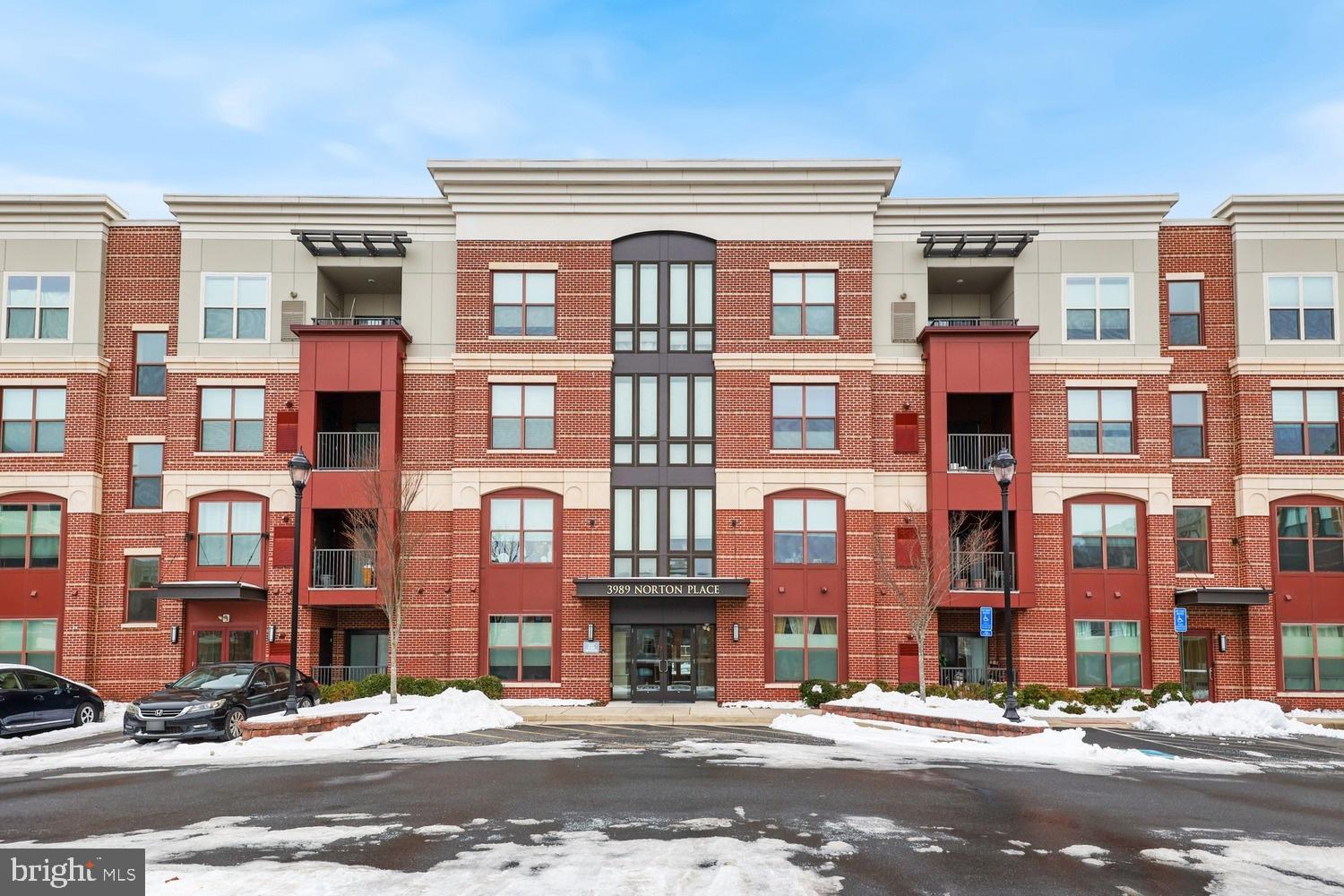Spacious 2-bedroom, 2-bath ground-floor condo with a den in the heart of Fairfax! Freshly painted, this open-concept home boasts an updated eat-in kitchen with stainless steel appliances and granite countertops, seamlessly flowing into the family and dining areas. Gleaming hardwood floors add warmth and elegance throughout. A versatile flex space near the entrance can serve as a home office, workout area, or reading nook. The primary suite features a CUSTOM walk-in closet, dual vanities, and a glass-enclosed walk-in shower. An enclosed patio offers a private retreat for relaxation. This unit includes one assigned parking spot in a secured underground garage with elevator access. Conveniently located near premier dining, shopping, and fitness options, with easy access to Route 50, Route 29, Little River Turnpike, and I-66. Don’t miss out on this rental unit!