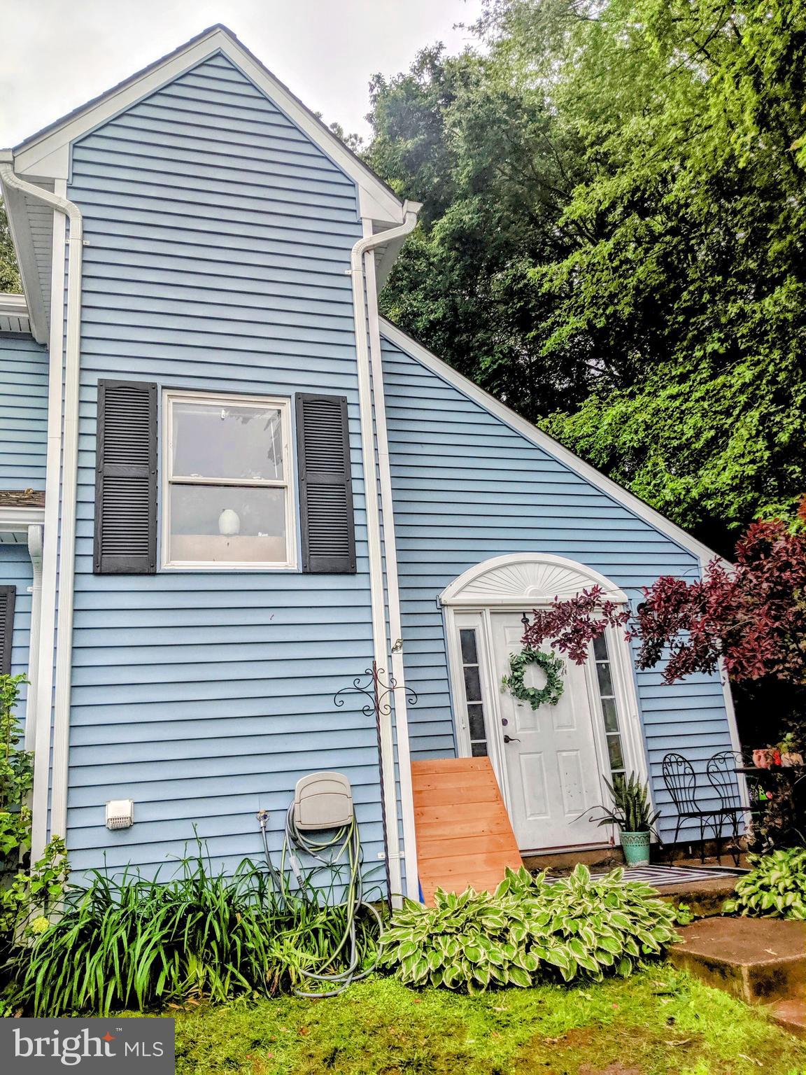 WOW!  Here's your chance to own an affordable home!  End unit next to woods and easy commute.  Rare 2 Br and 2 full bath unit includes fireplace, updated appliances, new roof, vaulted ceiling could be yours.  INVESTORS...this could possibly rent for $1,750/month or more!!